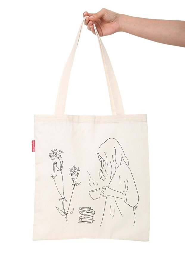 Woman Drinking Coffee from Cloth Bag