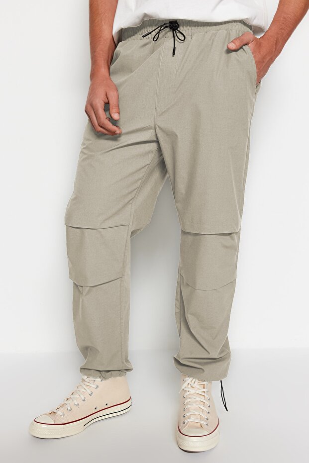 Açık Haki Lastikli Beli Bağlamalı Jogger Fit Baggy Paraşüt Pantolon TMNSS23PL00045 - 1