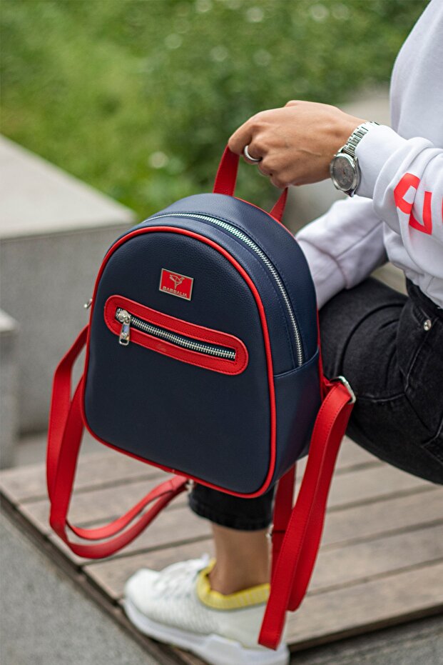 Oslo Women's Navy Blue Red Backpack with Double Inner Pocket Detail and External Zipper Eyes.
