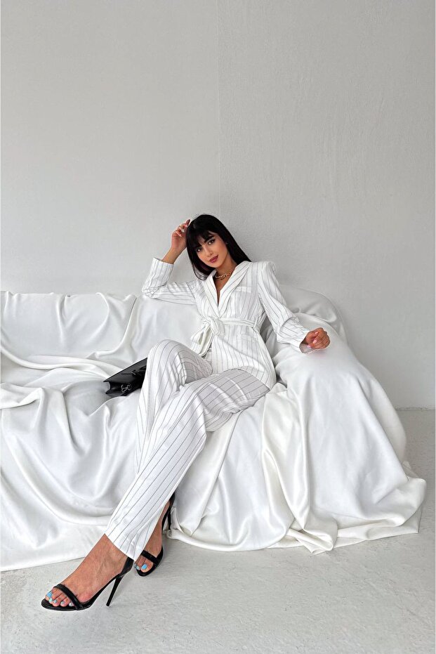 Damska marynarka z kołnierzem szalowym i kieszeniami, wiązana, z elastycznymi spodniami i rurkami - 5