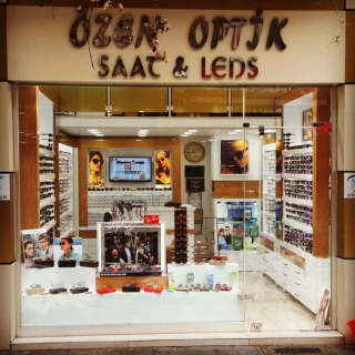 ÖZEN OPTİK SAAT&LENS logo