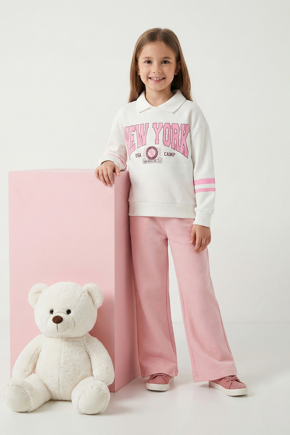 TRENDYOLKIDS Rosafarbenes, mit Slogan bedrucktes, übergroßes Strickoberteil mit Polokragen für Mädchen aus Baumwolle – Oberteil-Set TKDAW26AU00002
