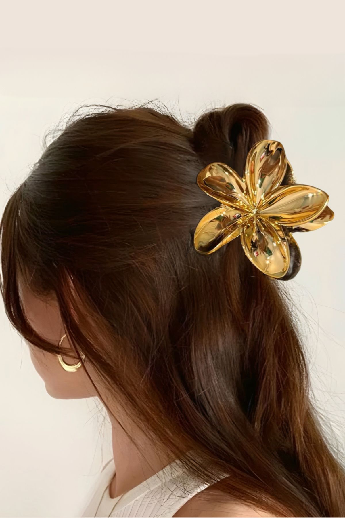 Gold flower clip store