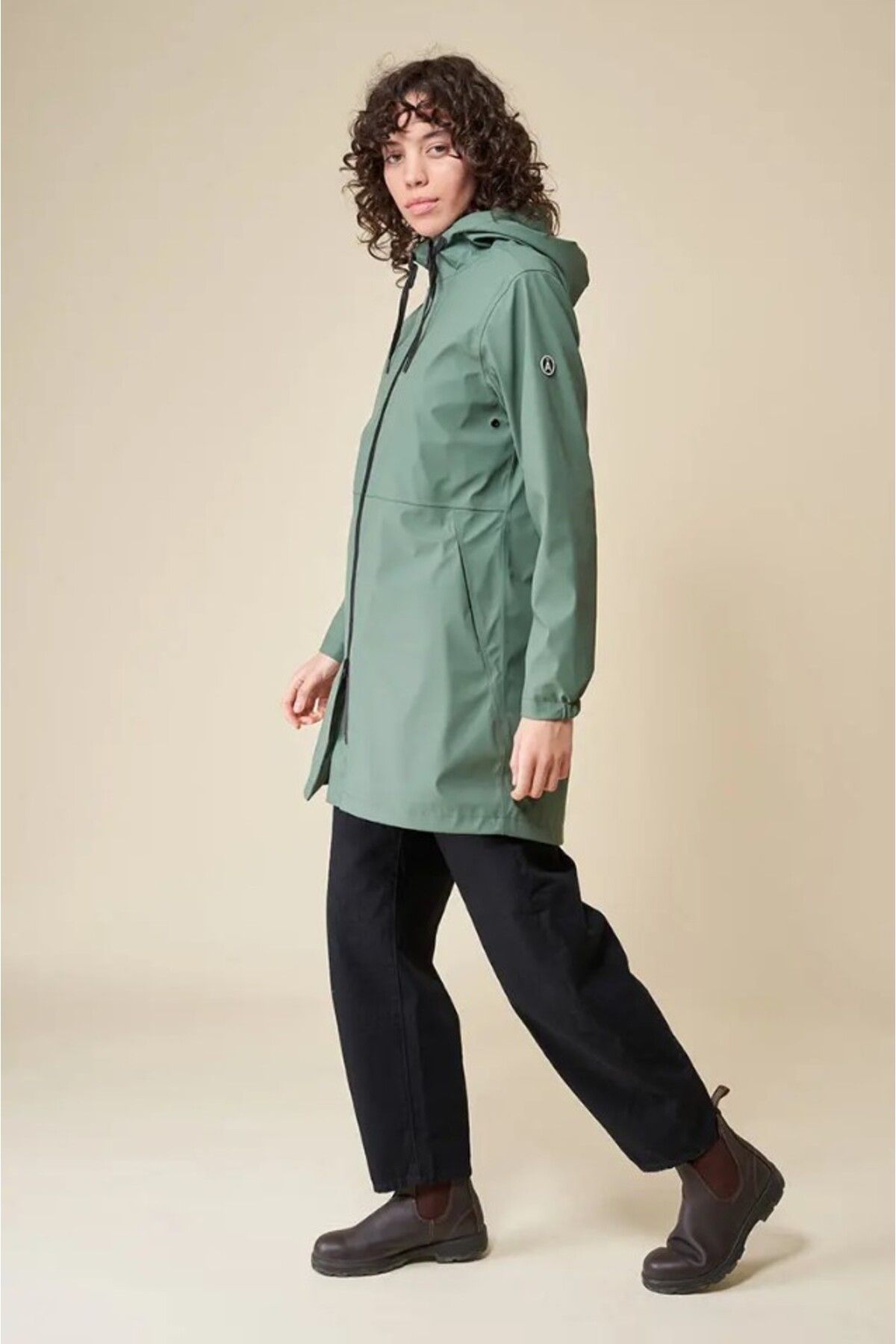 Green raincoat shop with hood