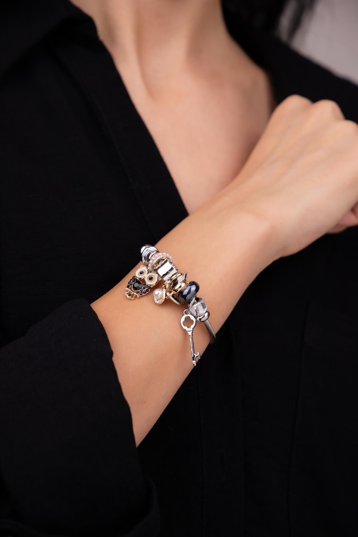 Black shop charm bracelet
