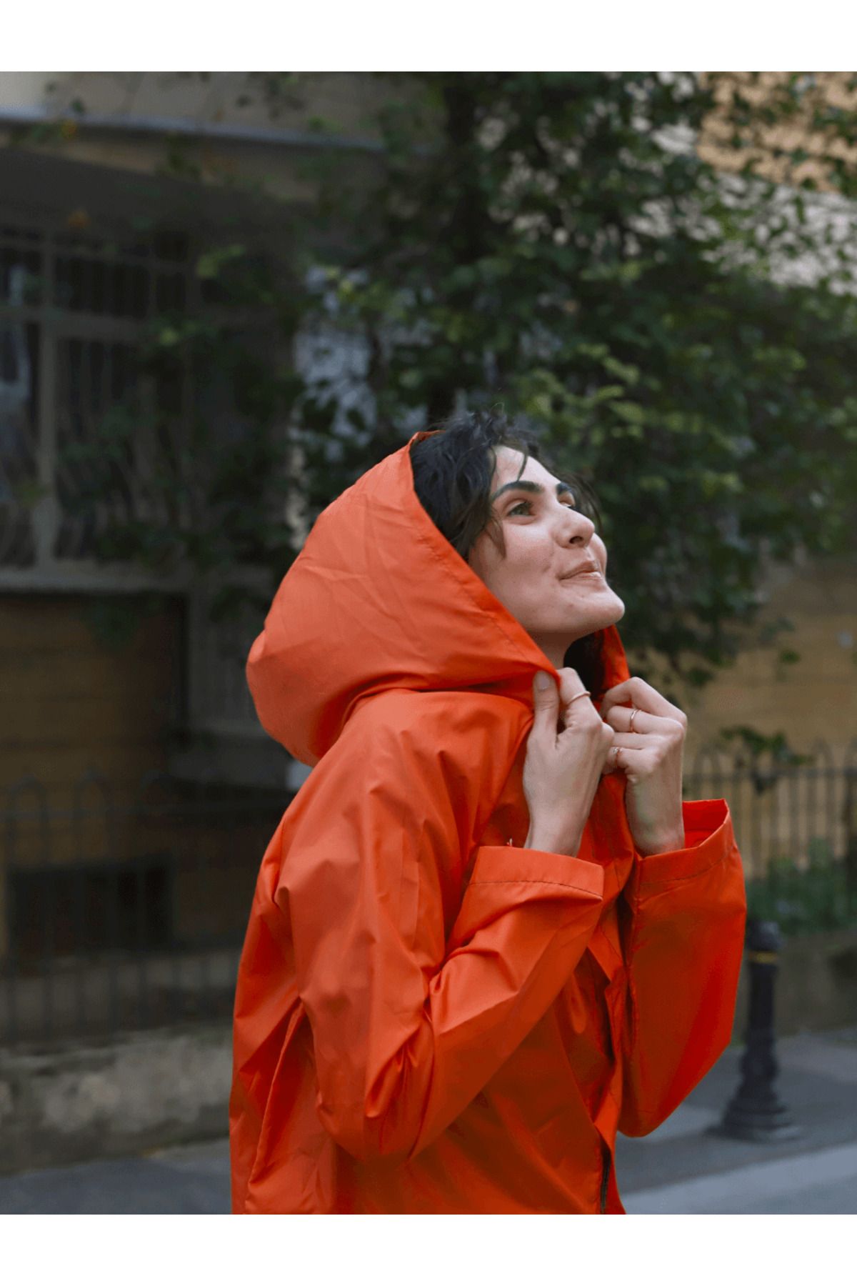 Womens orange raincoat discount