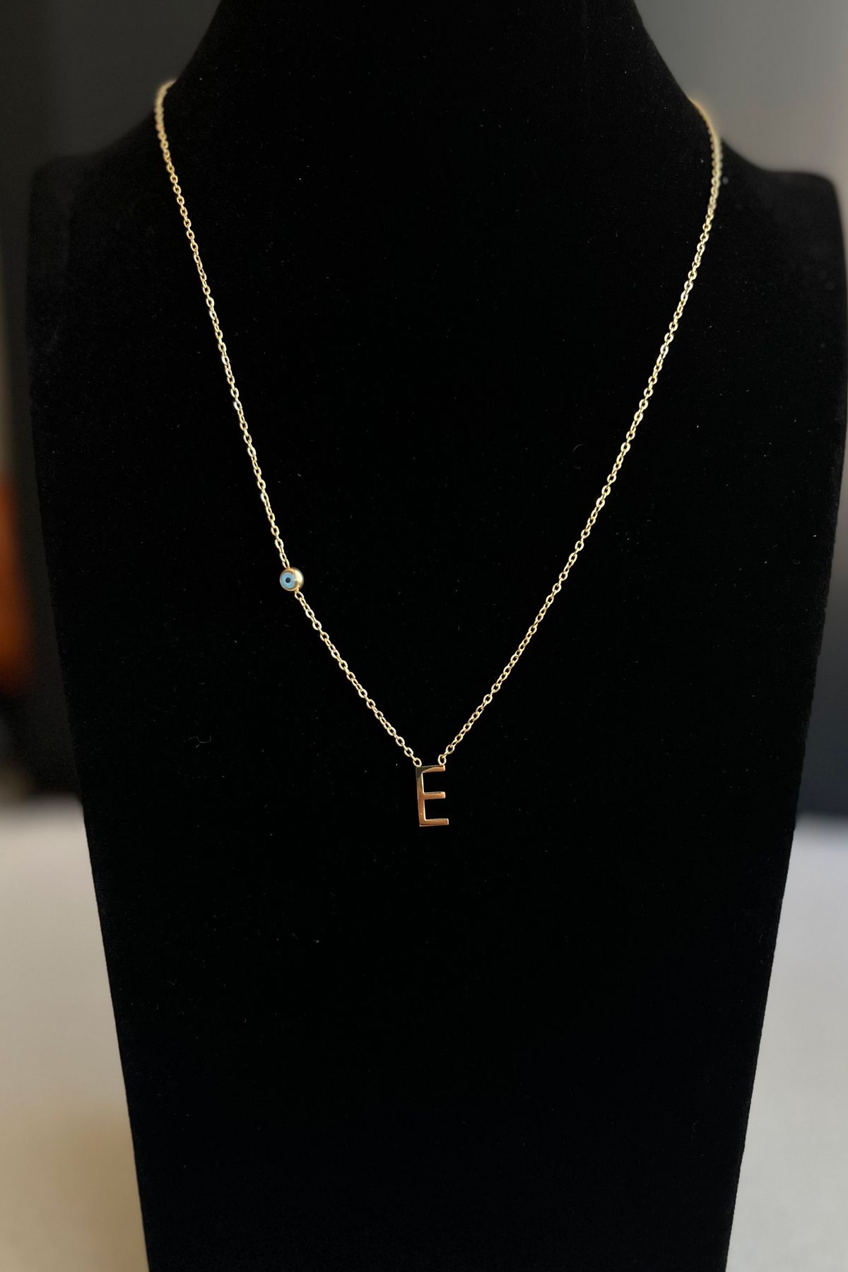 Gold e best sale pendant
