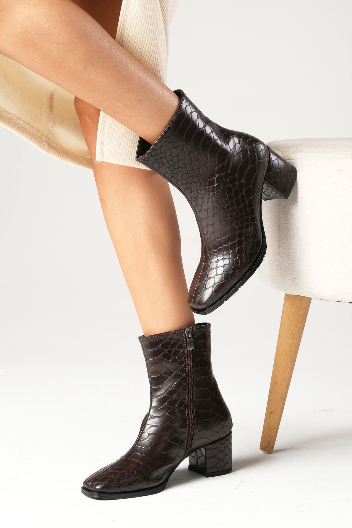 Crocodile top heeled boots