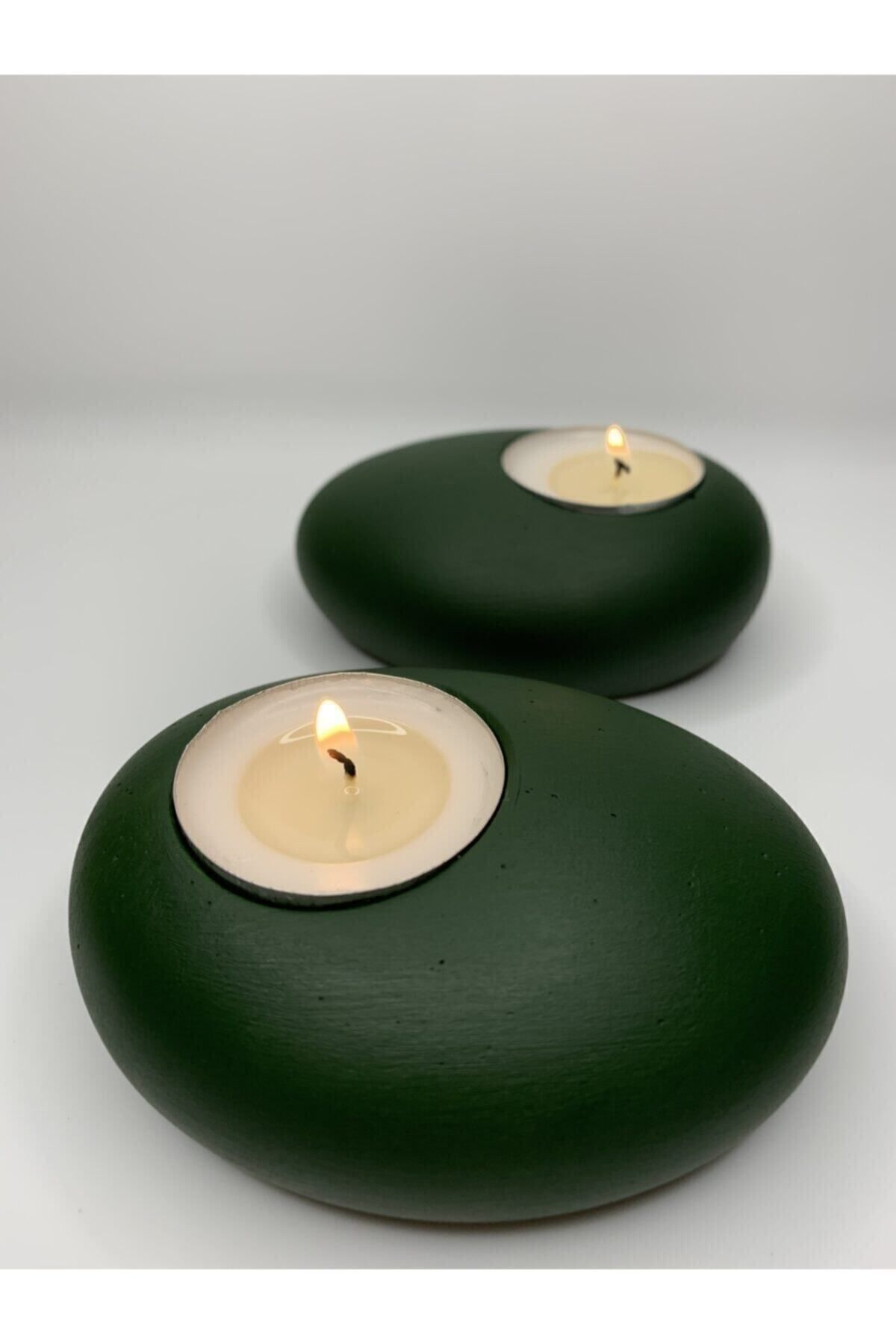 Green shop candlestick holders