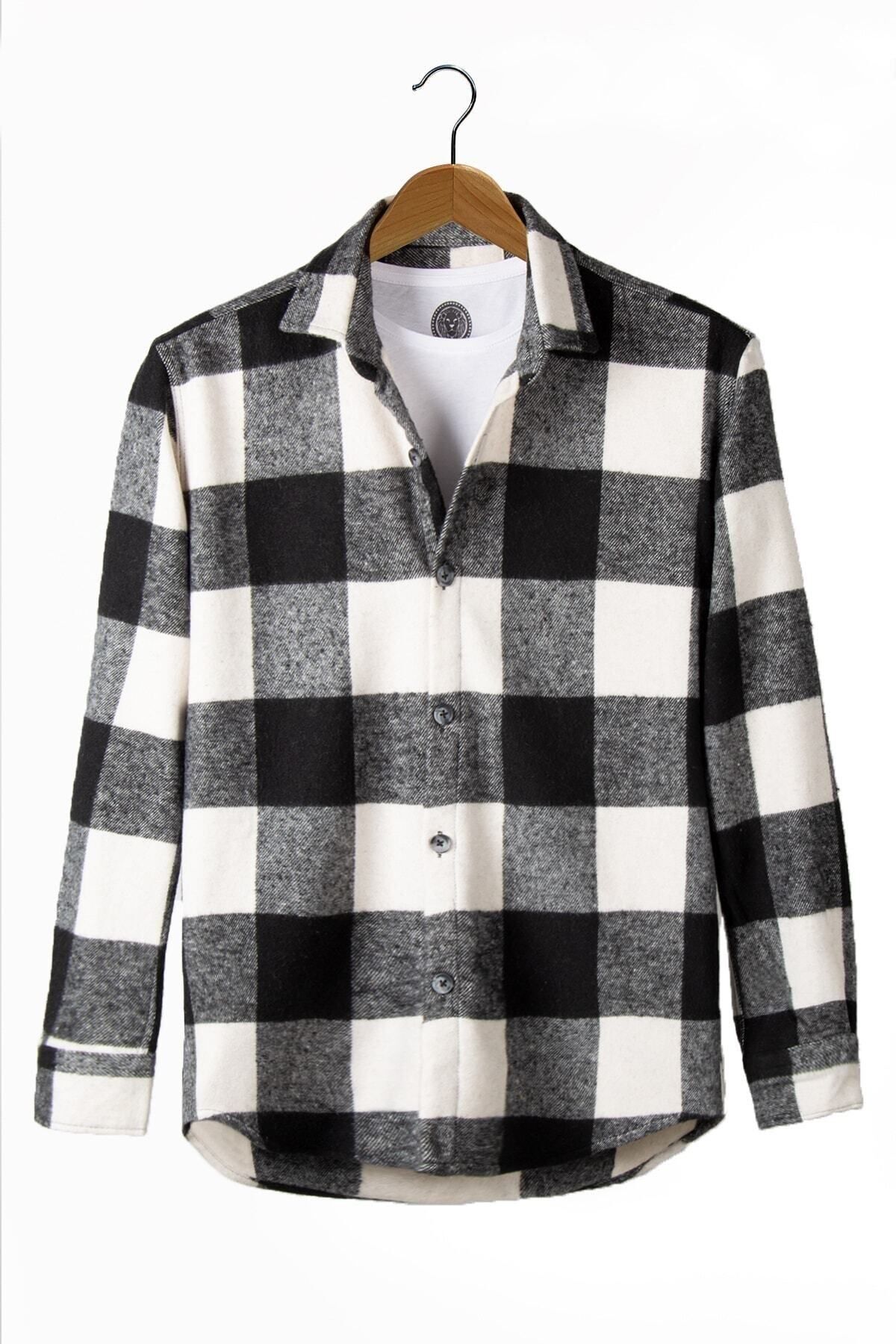 cest une chemise en bois noir et blanc