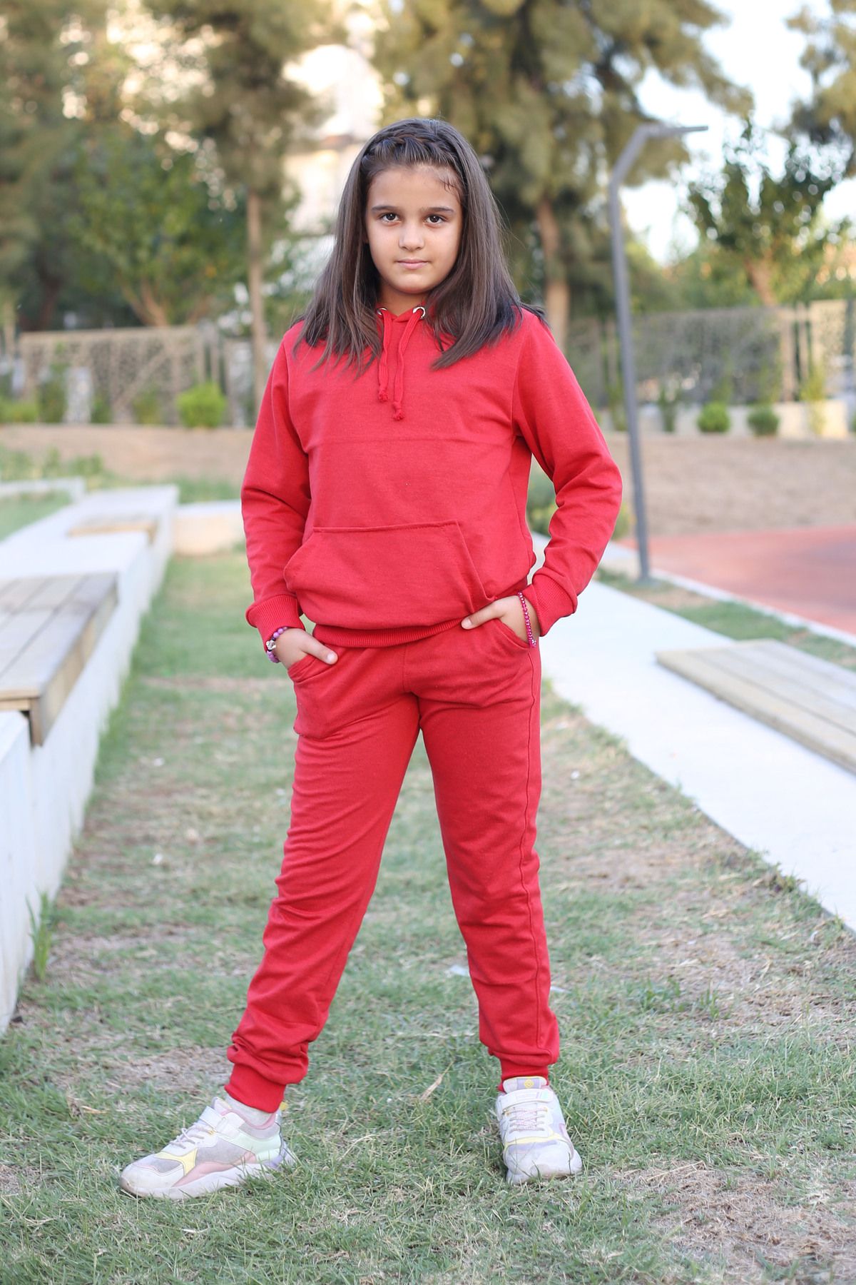 Girl wearing tracksuit sales