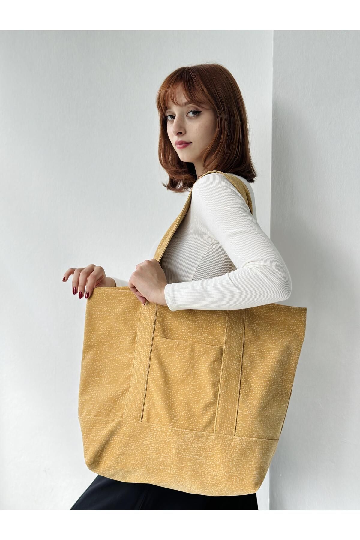 Gold canvas bag online
