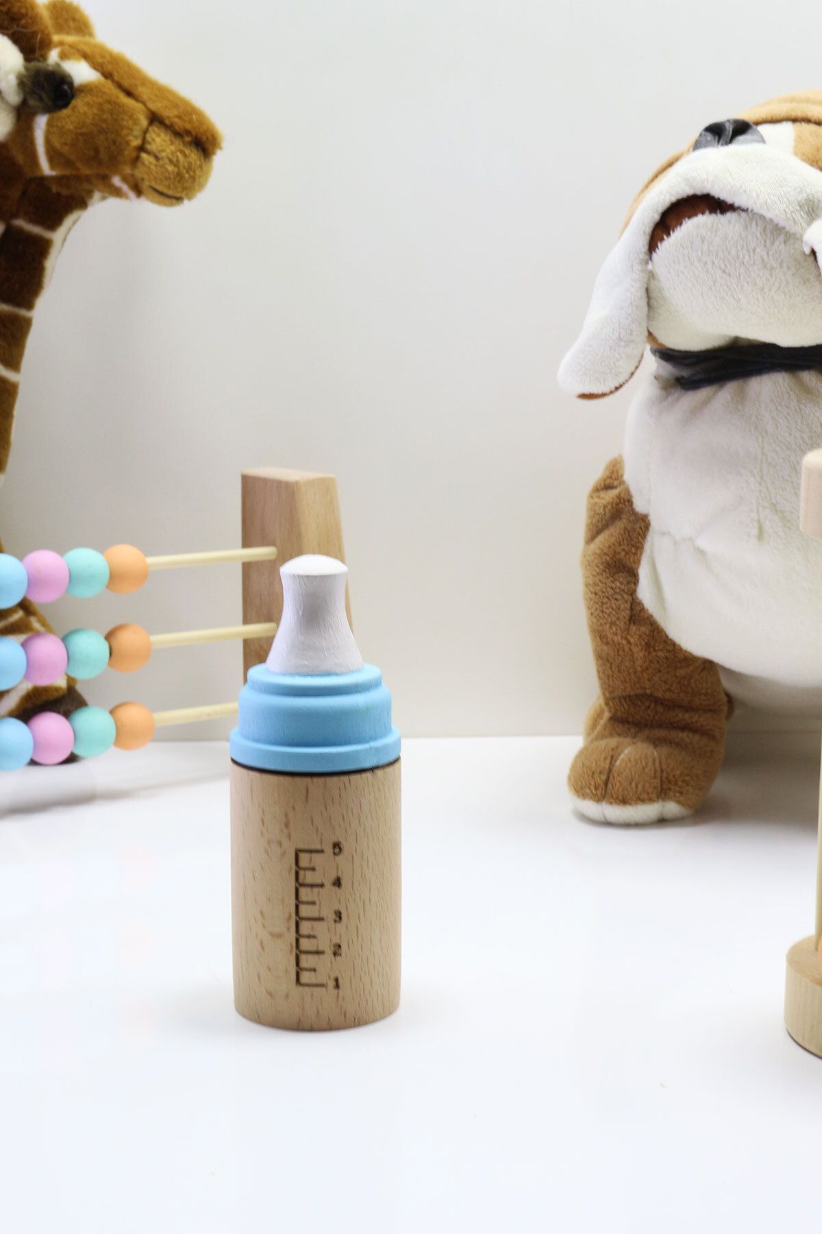 Wooden baby shop bottle toy