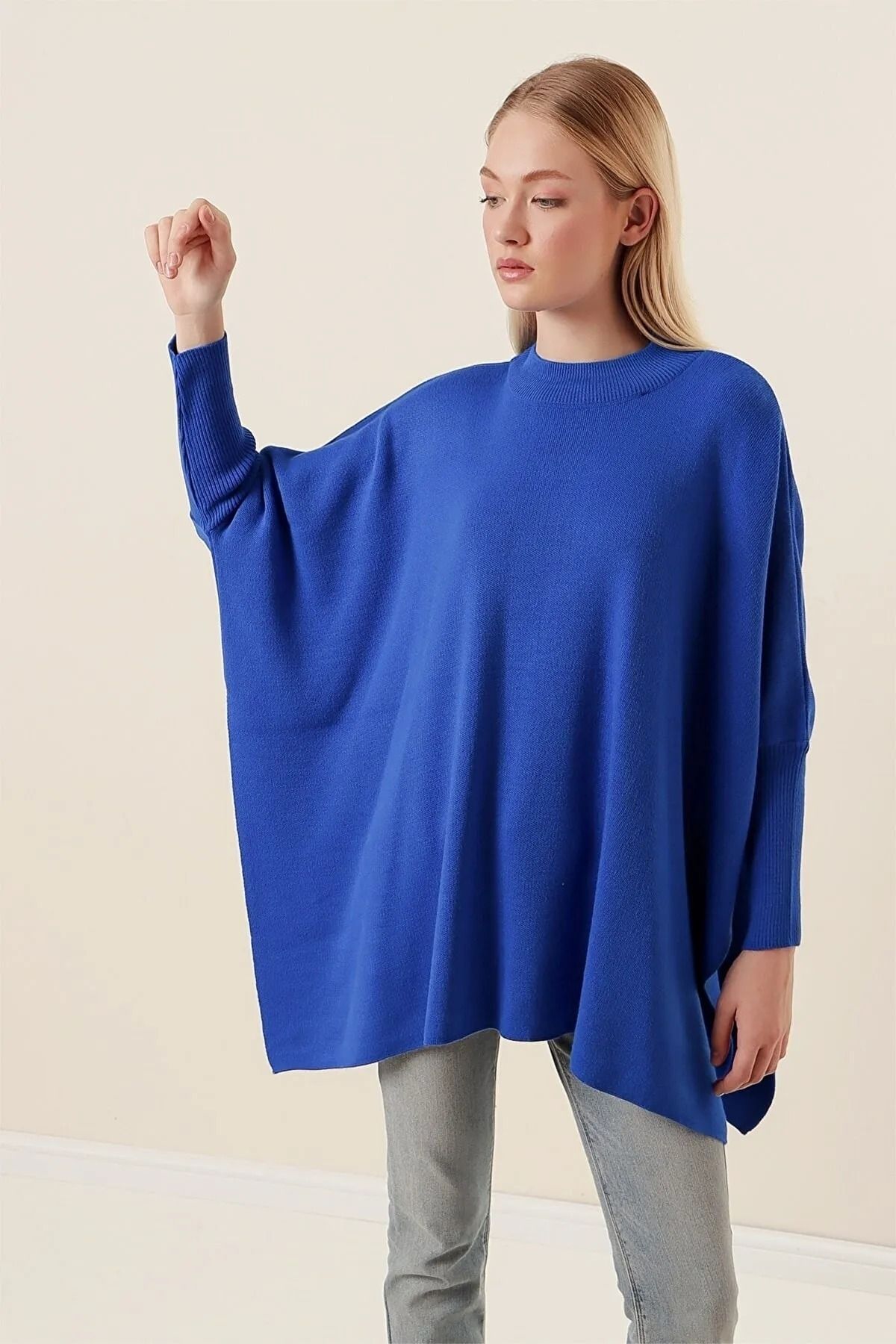 Royal blue poncho sweater on sale