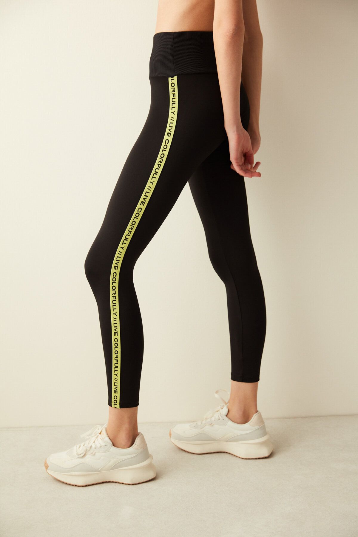 Black leggings clearance with gold stripe