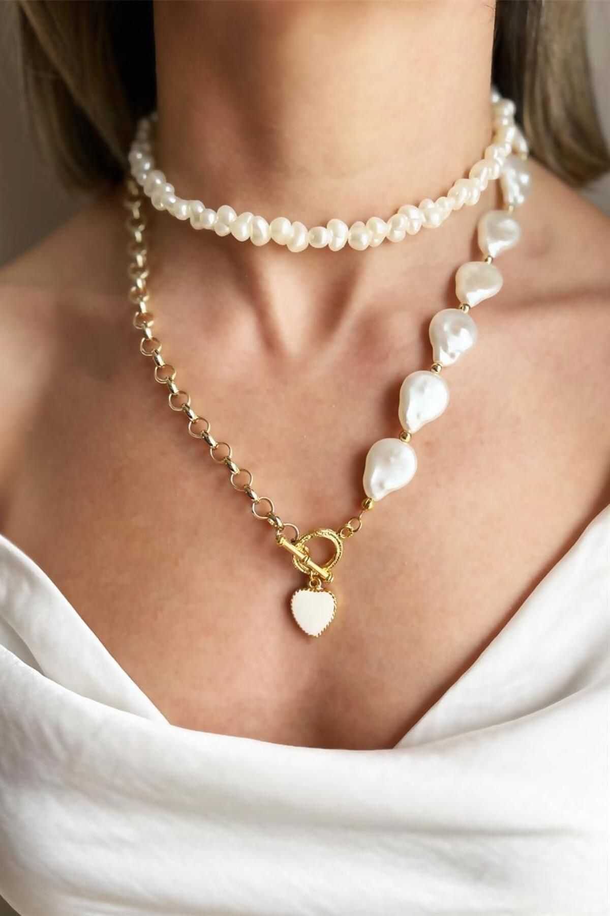 White pearl shop necklace with gold