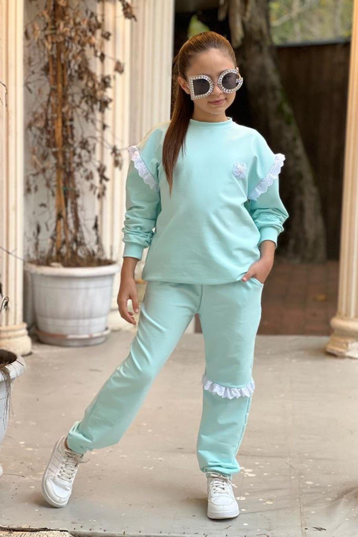 Turquoise tracksuit hotsell