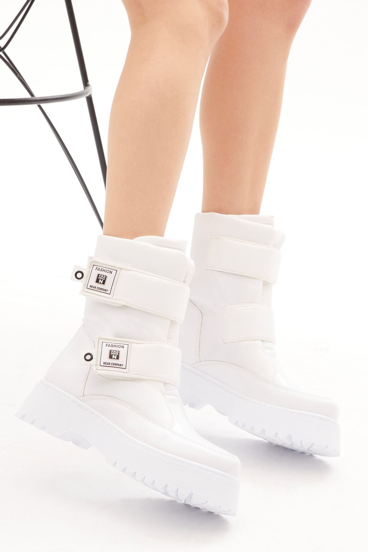 White boots with 2025 velcro straps