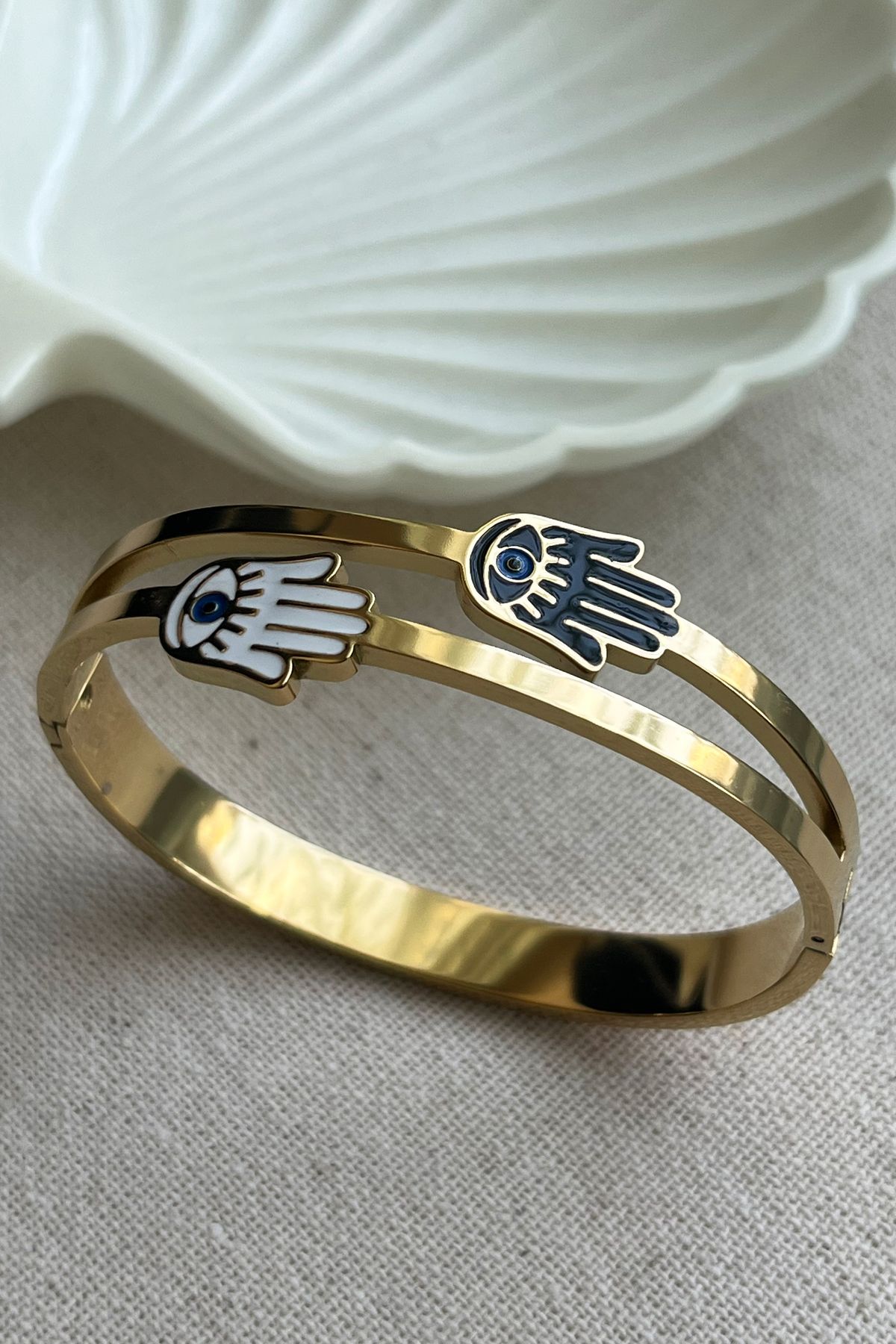 Hand on sale holding bracelet