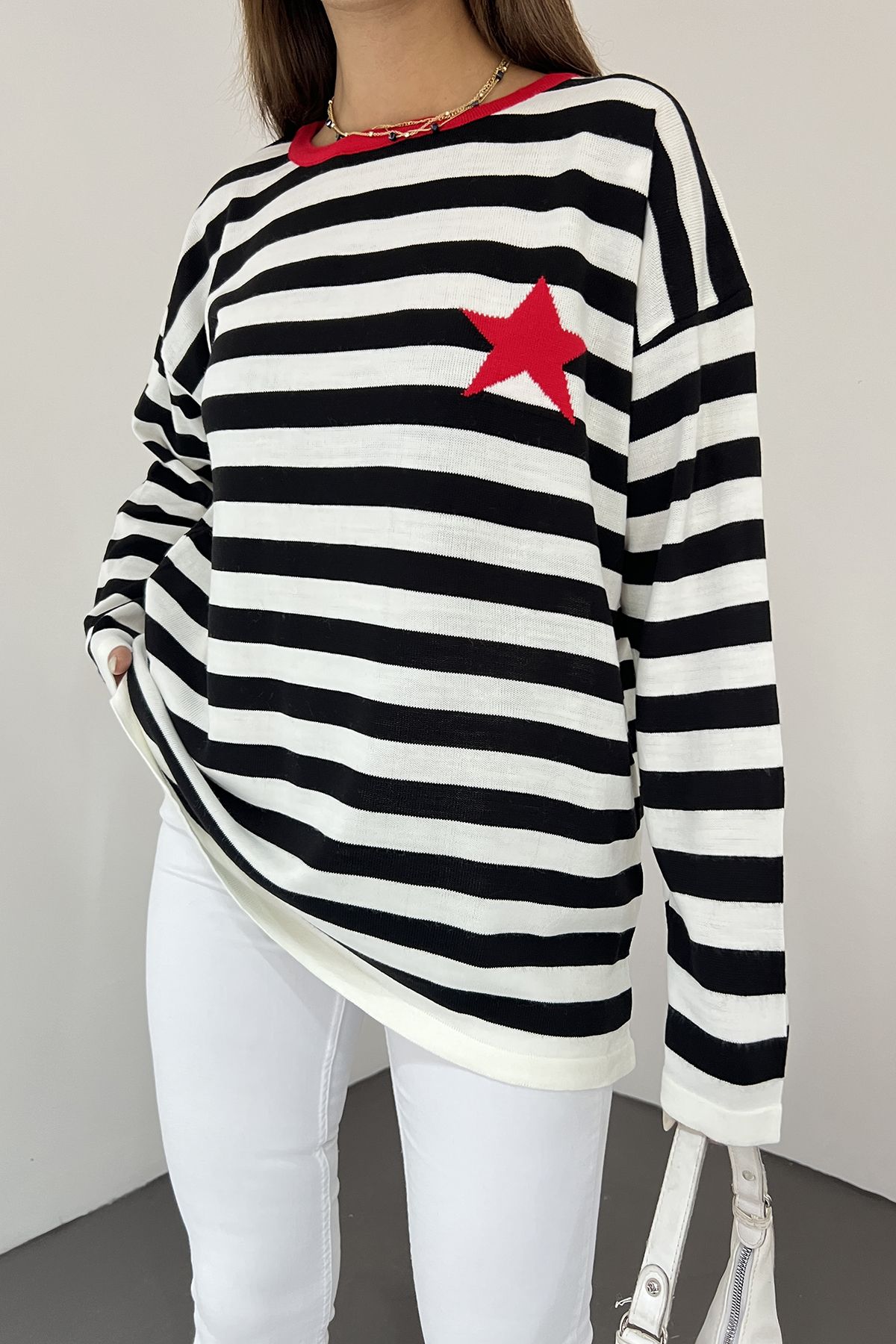 Black sweater with red and white stripe clearance