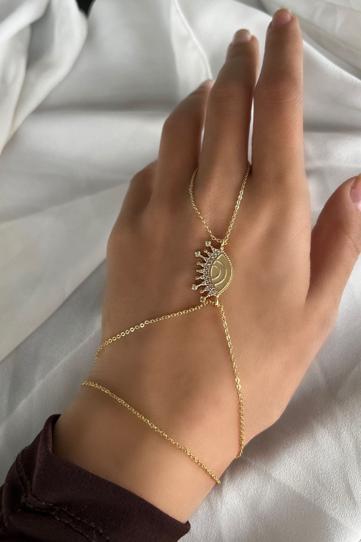Gold hand on sale chain bracelet