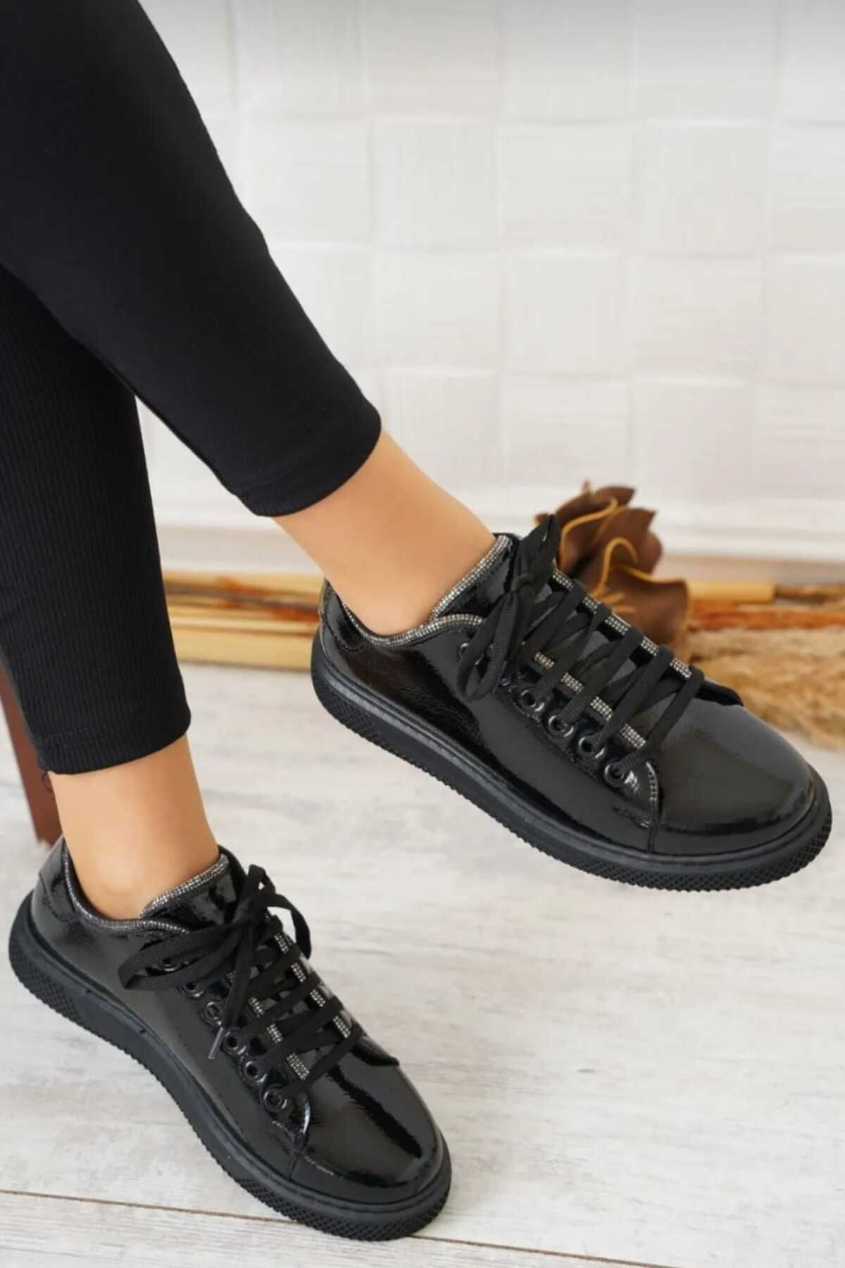 Eray Women s edge stone detailed wrinkled patent leather sneakers