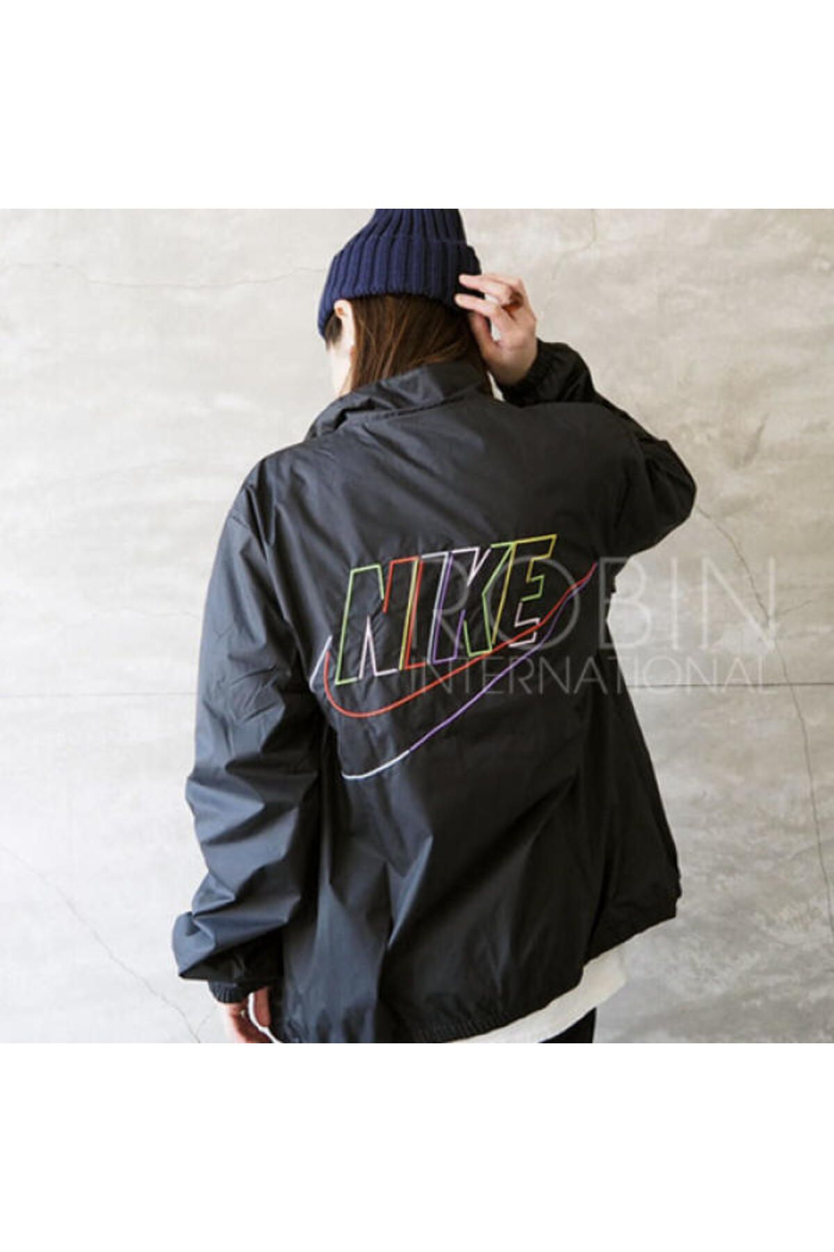 Nike gold sales and black jacket