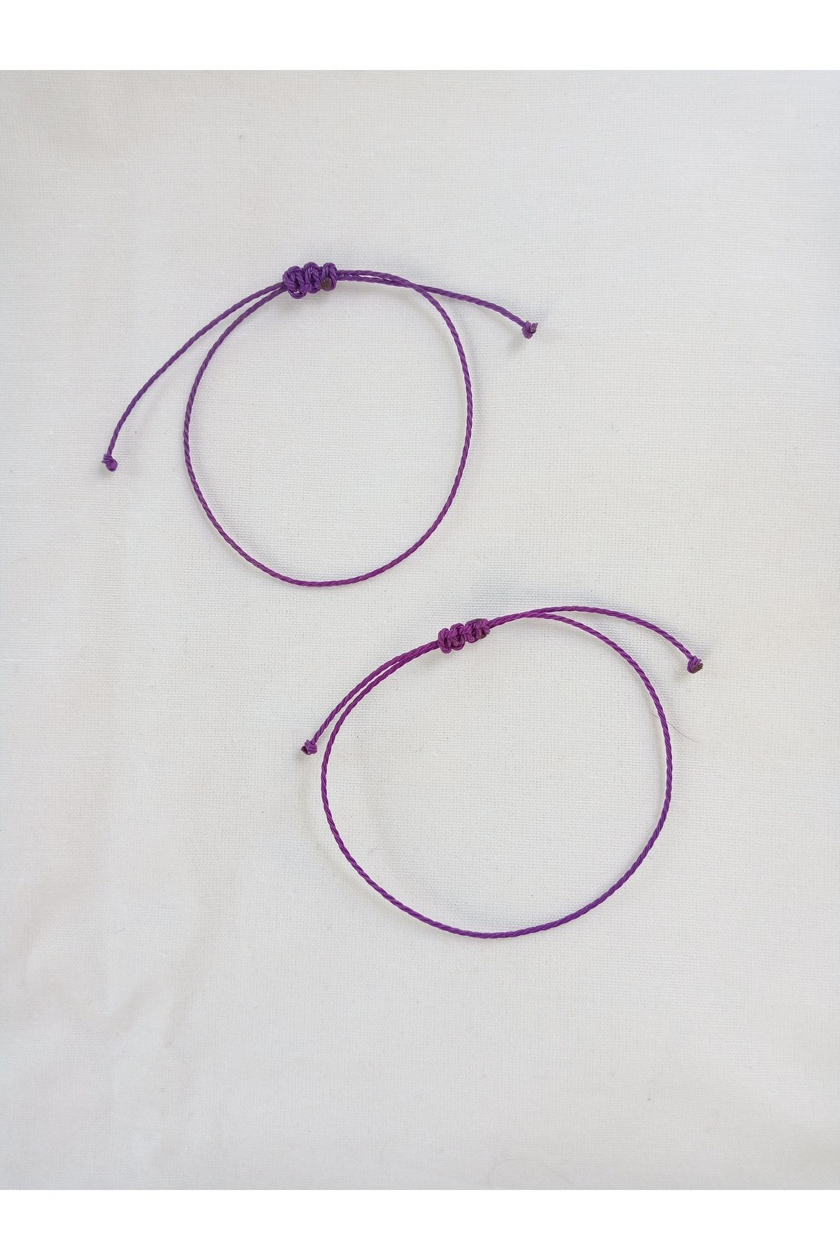 tutu tasar m alacat Two Purple String Bracelets
