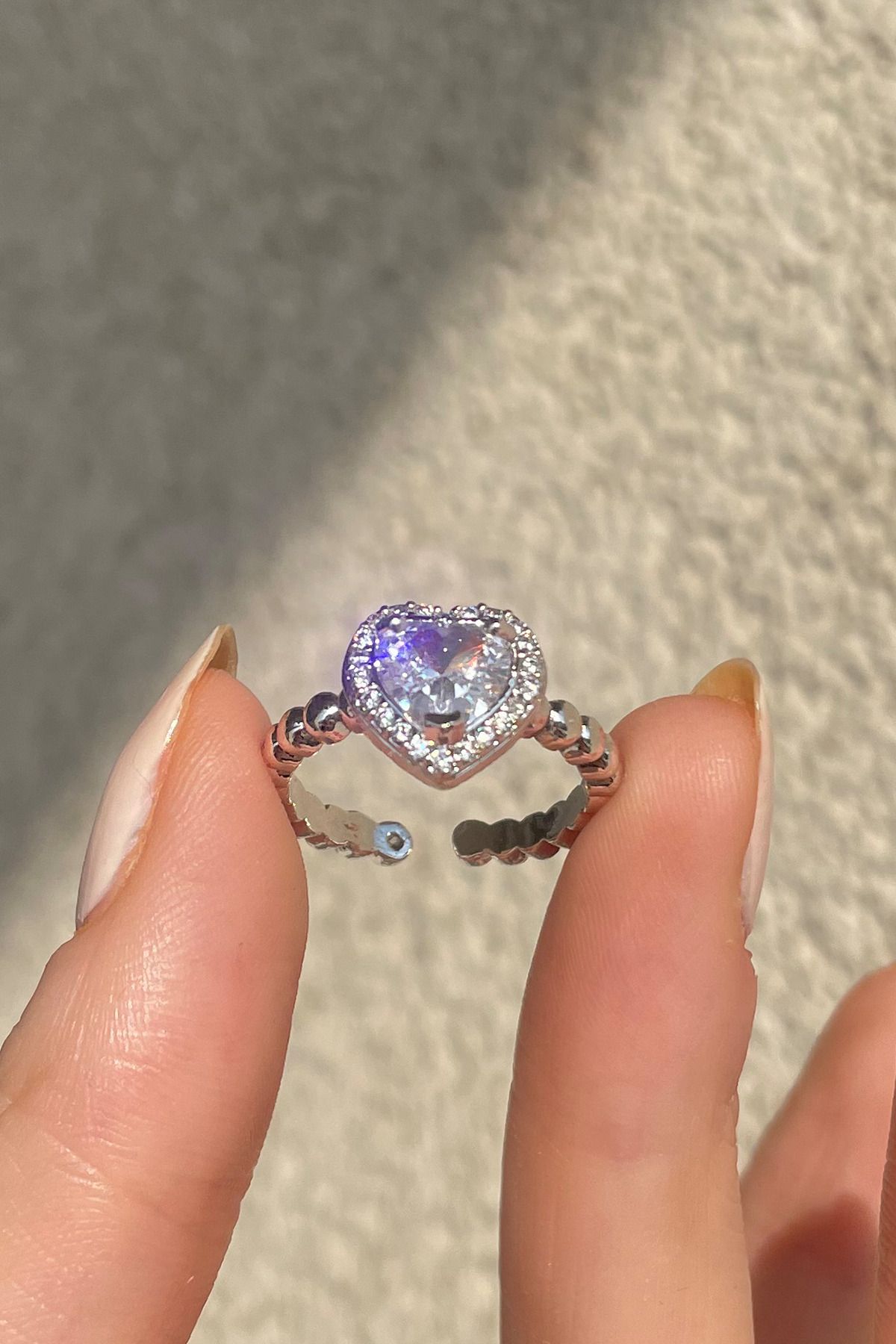 Sparkling blue elevated store heart ring