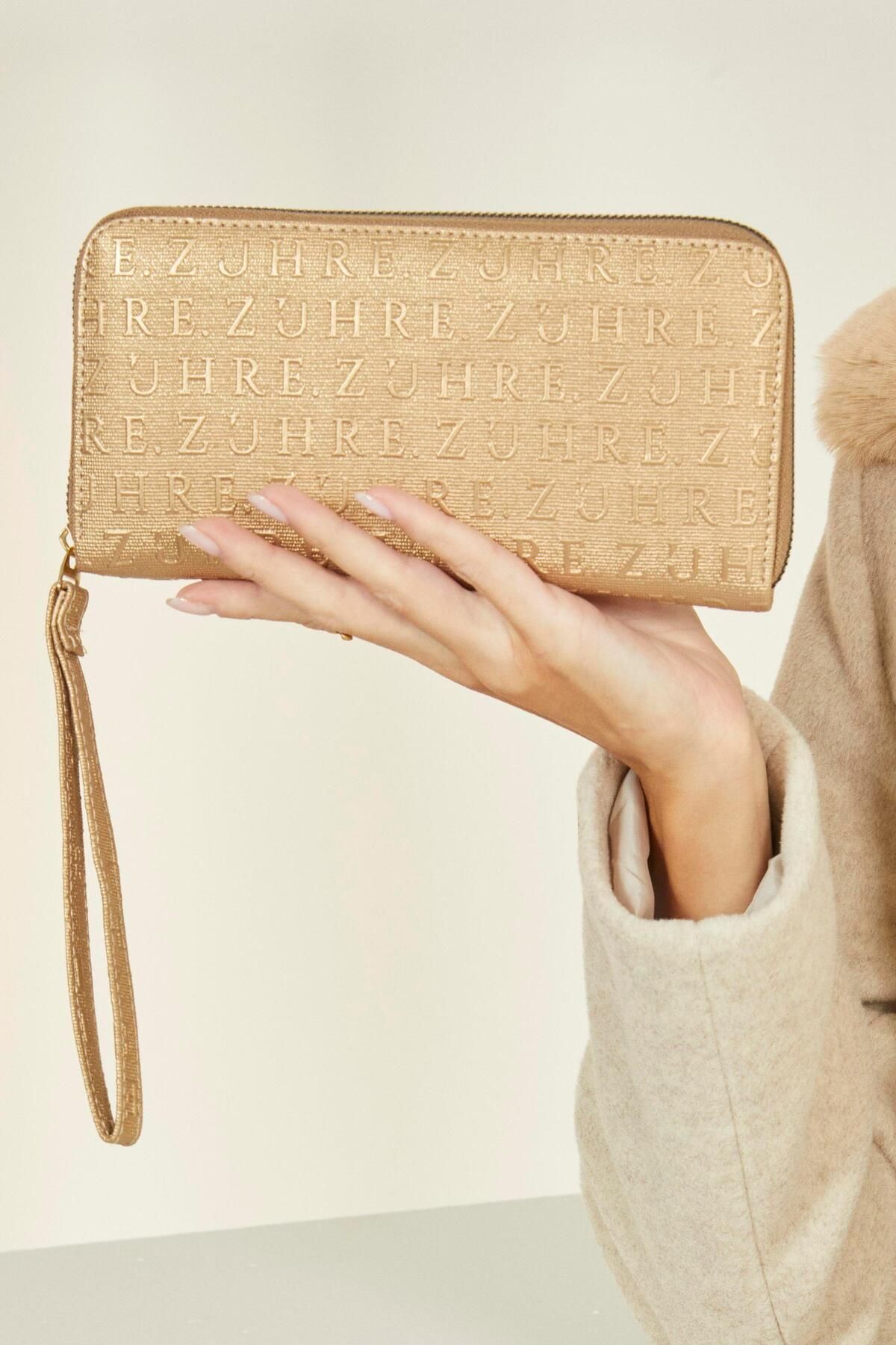 Gold wallet on sale