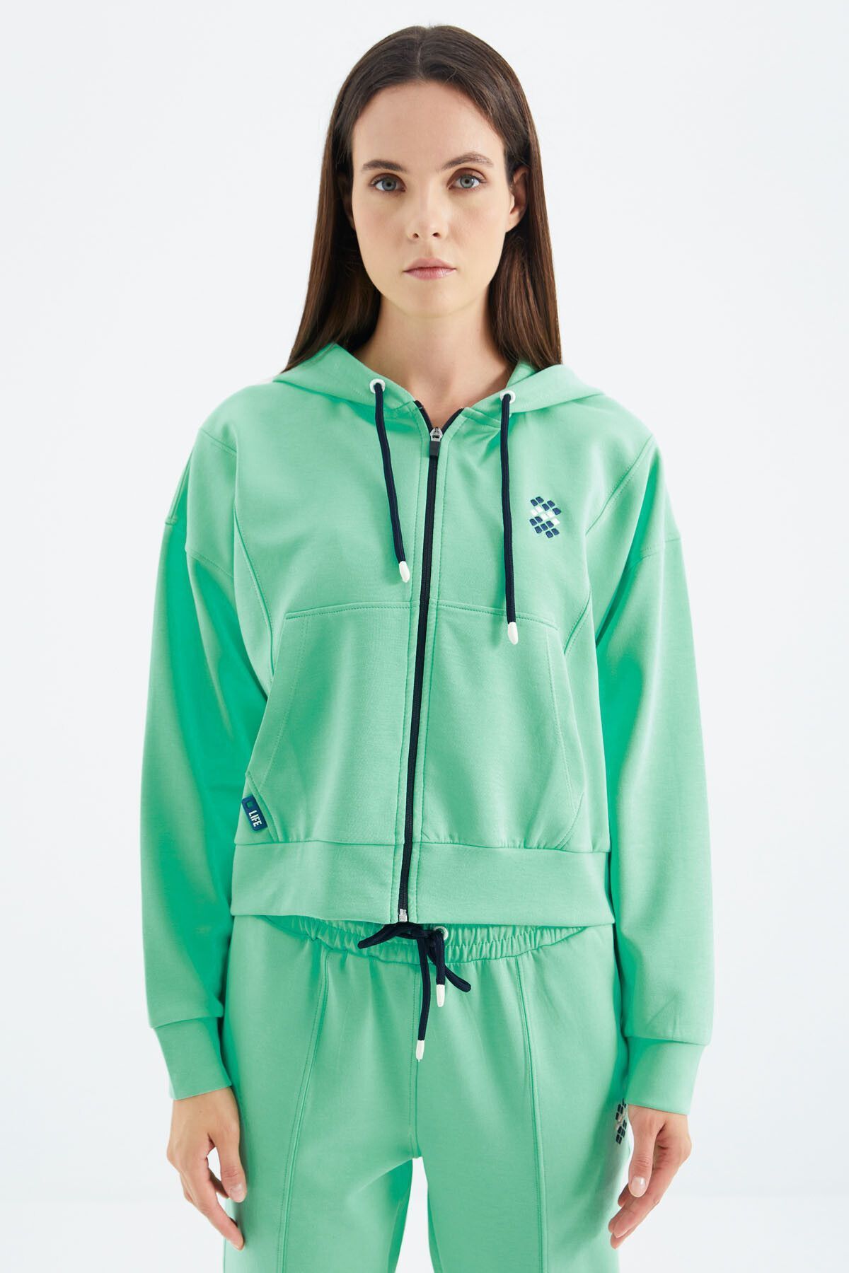 Mint green sales adidas tracksuit womens