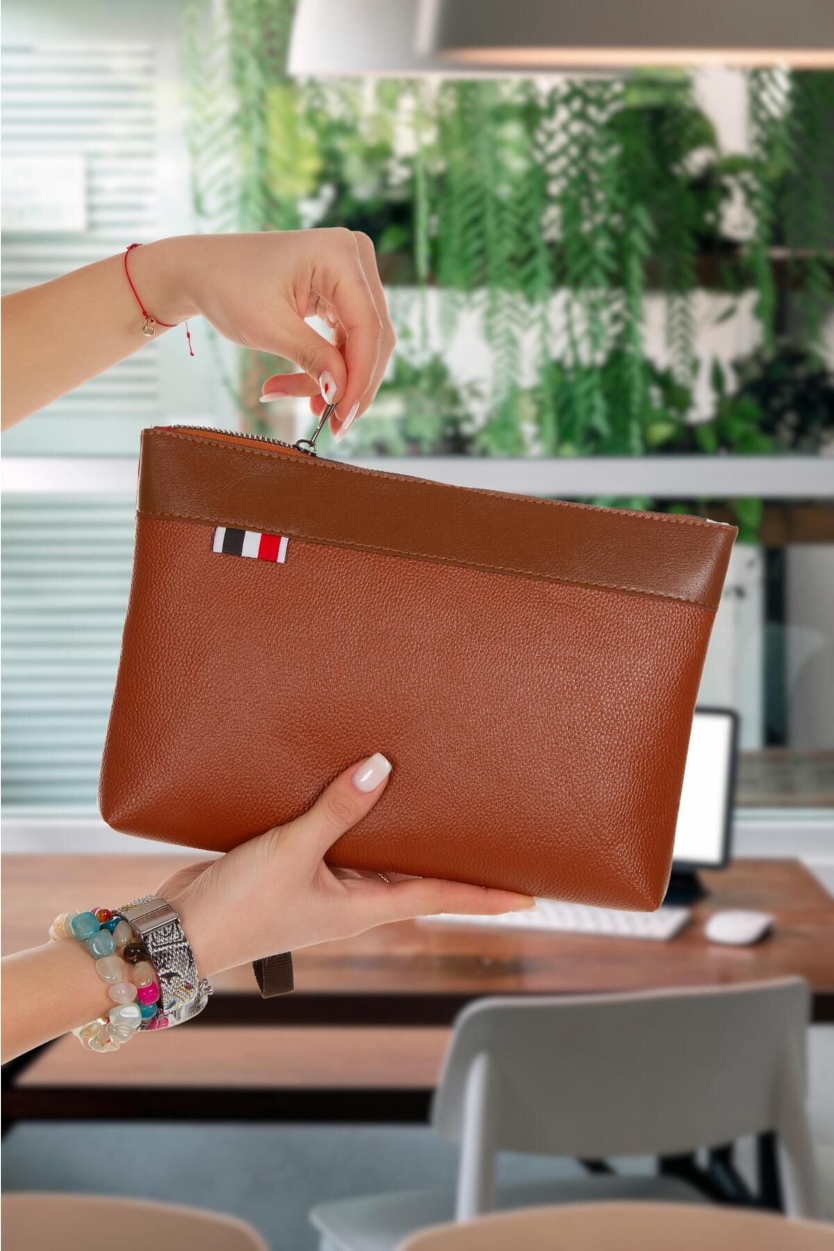 Handbag with sales wrist strap