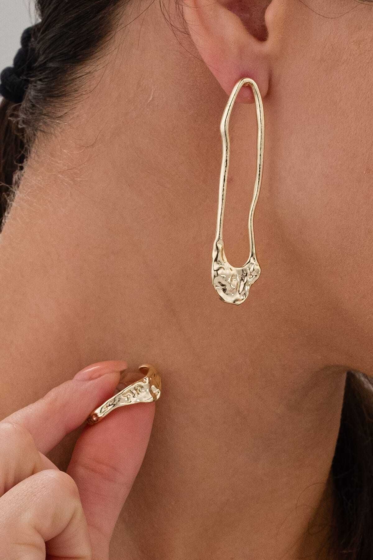 Two different earrings sale