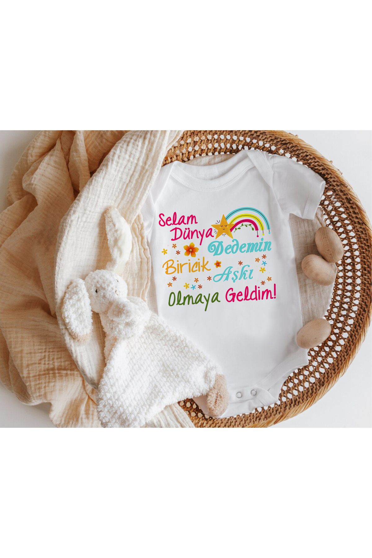 نیلز بیبی دیزاین فور بیبی بادی آستین کوتاه نیلزبیبی شاپ با نوشته‌ی «سلام دنیا، من آمده‌ام تا تنها عشق پدربزرگم باشم» (صورتی)