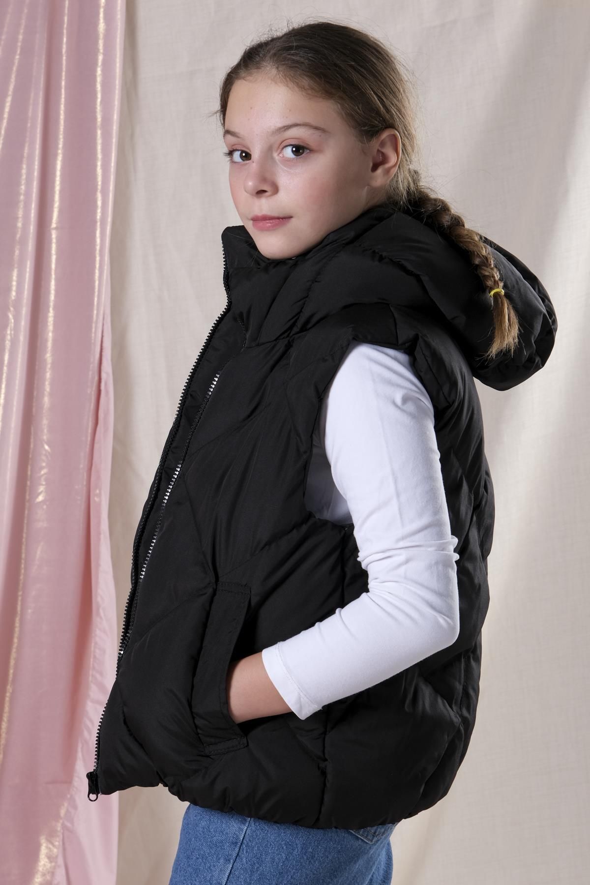 Girls black puffer vest sales