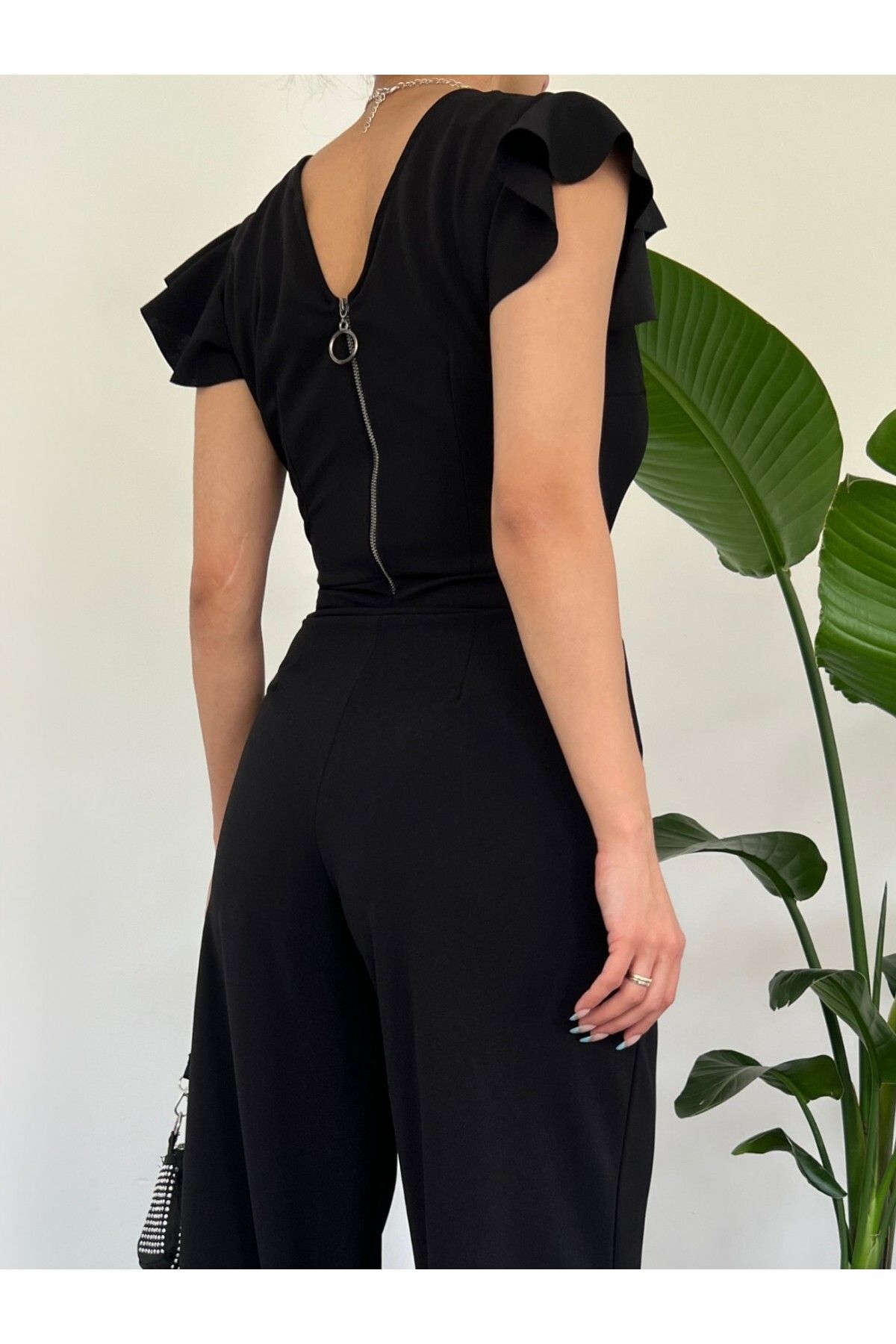 Black ruffle sleeve jumpsuit 2025