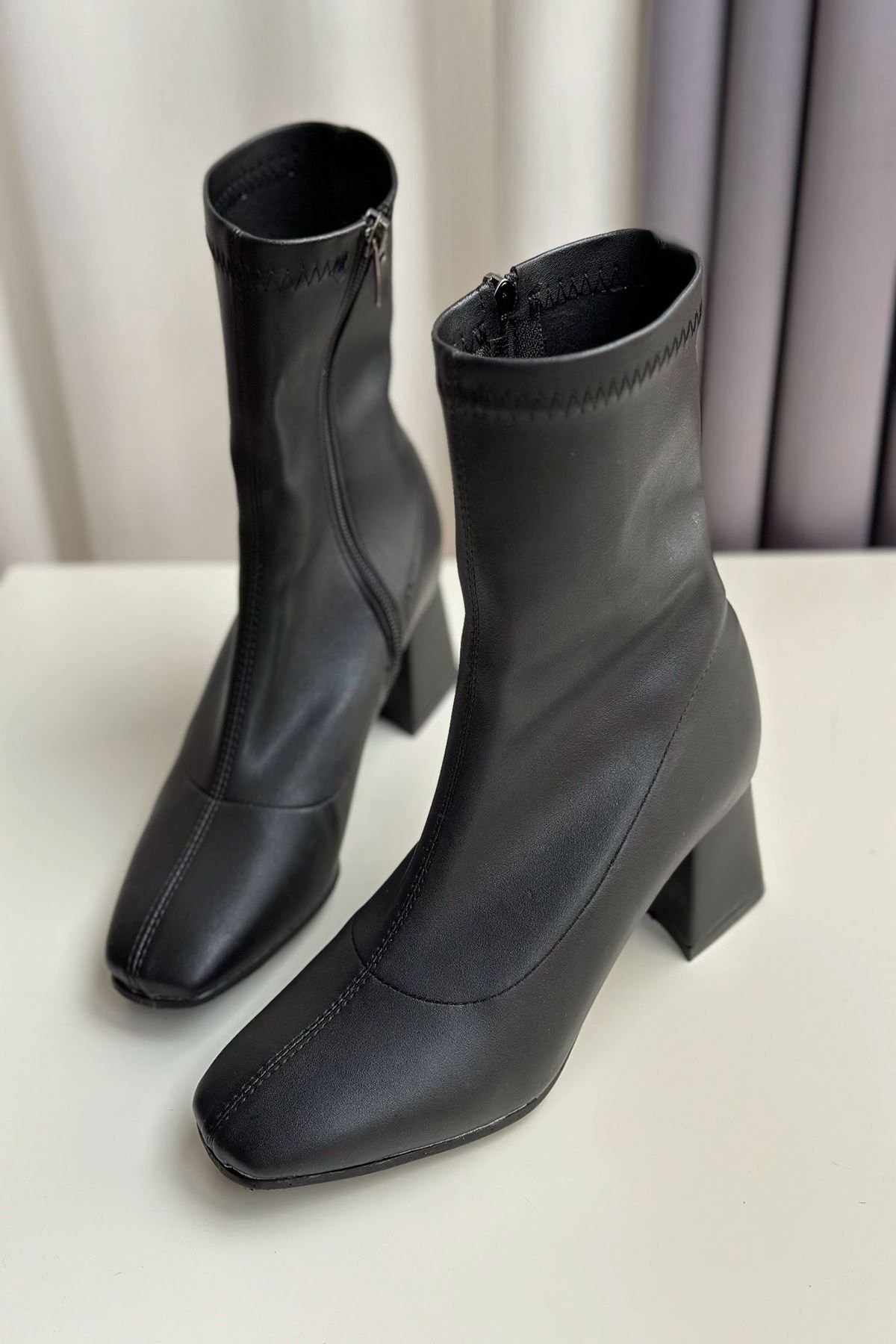 Cute black leather top booties