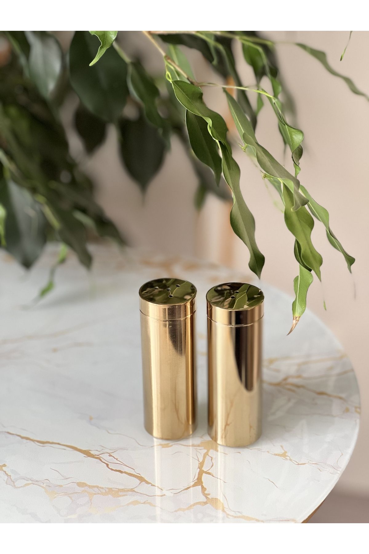 Gold salt shop and pepper pots