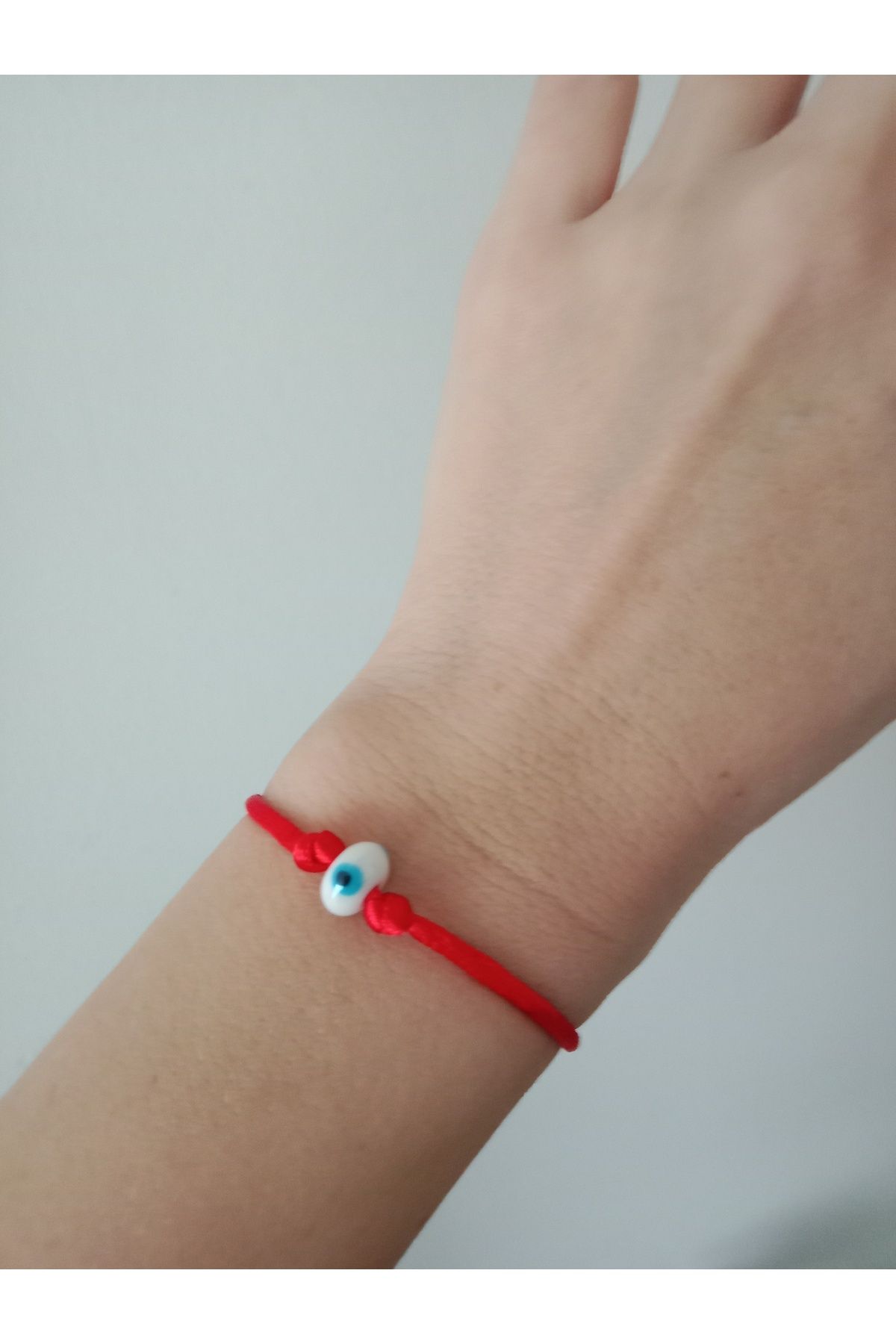 Evil eye shop thread bracelet