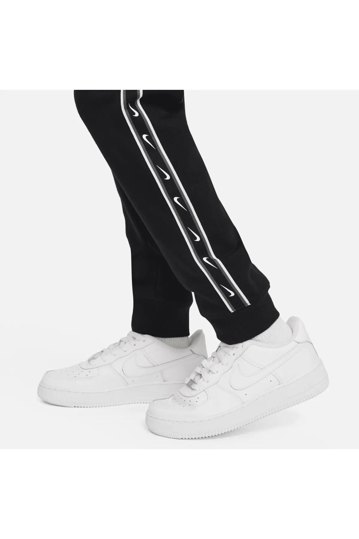Nike swoosh taped track pants cheap