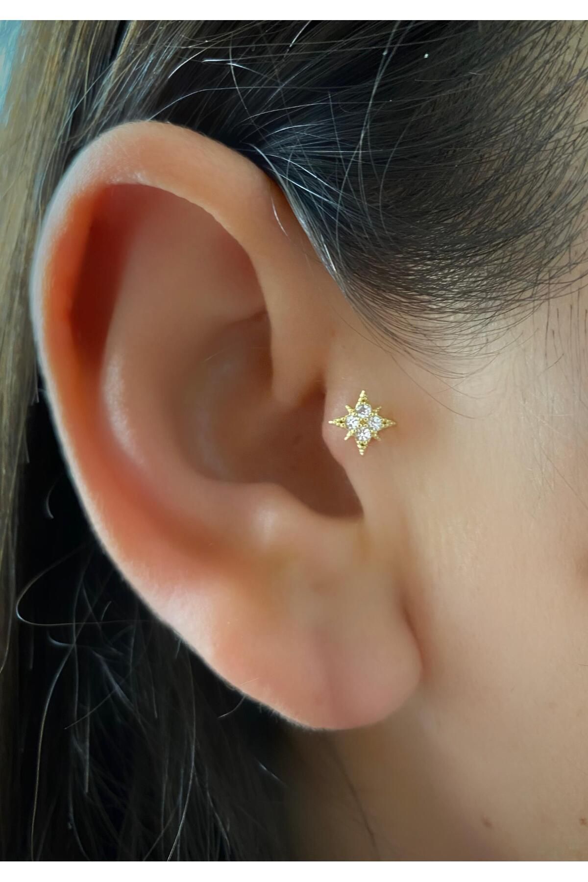 Star tragus hot sale piercing