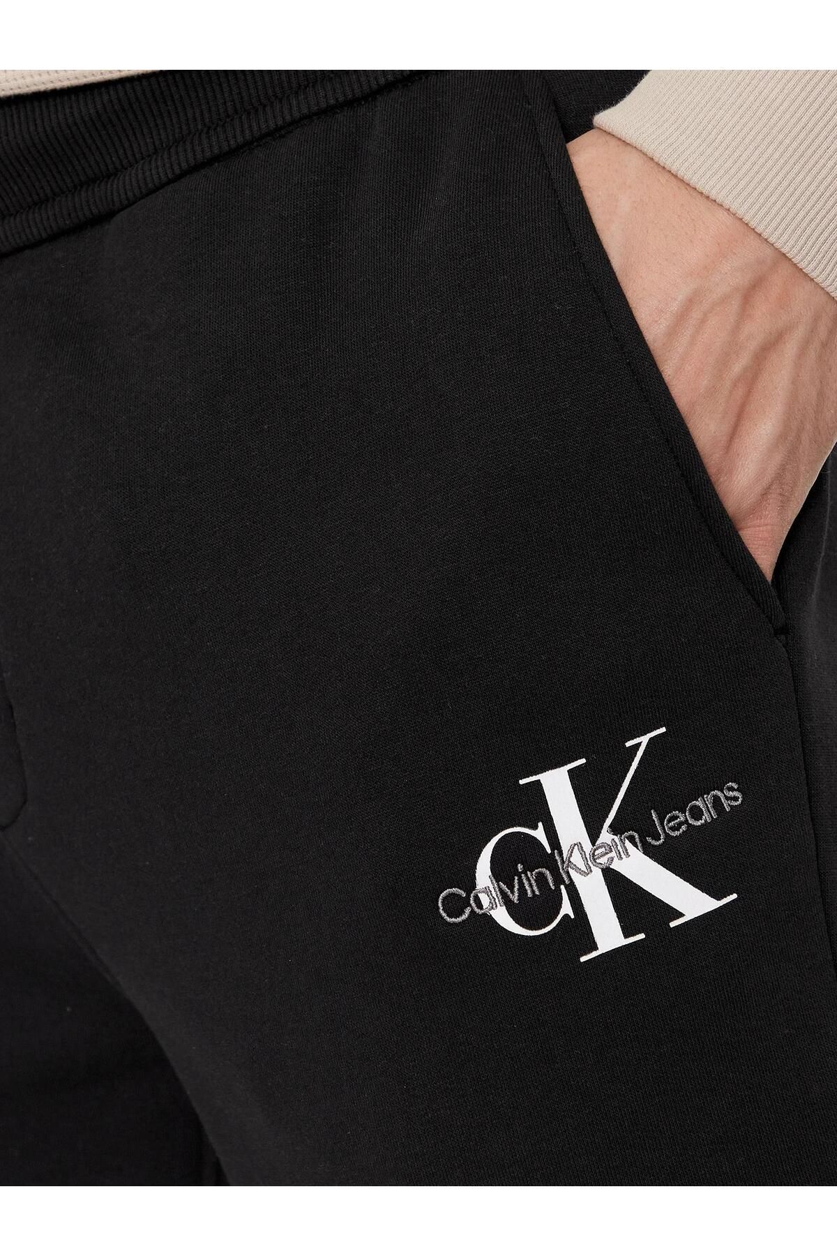 شلوار گرمکن مشکی مردانه مونولوگ HWK اورجینال Calvin Klein