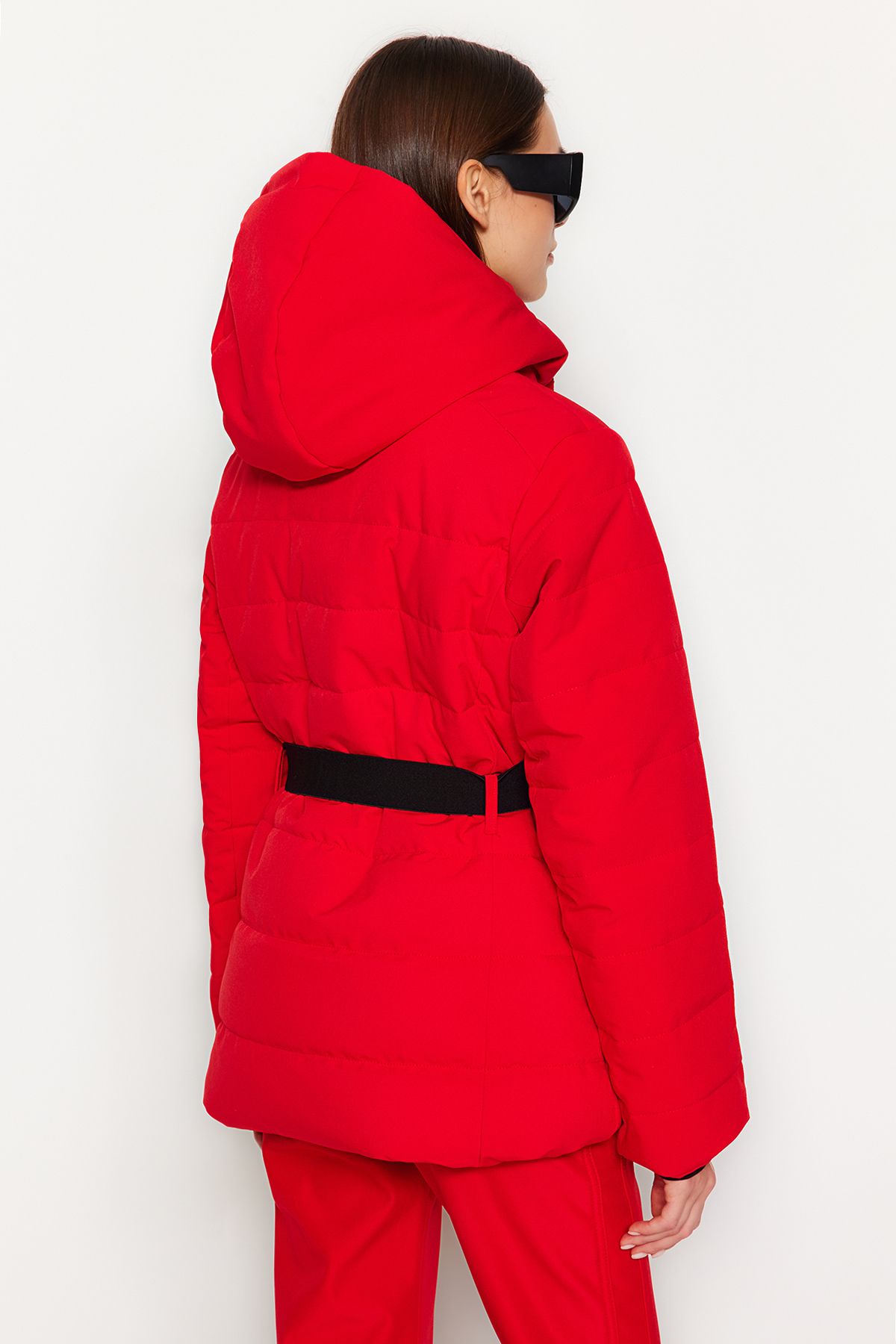 Red ski jacket store with fur hood