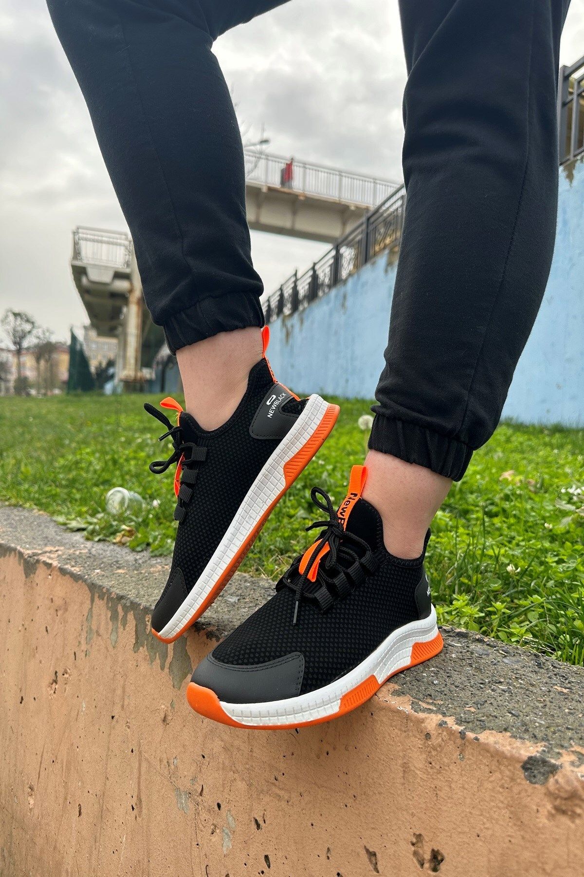 Flexible sports shoes top