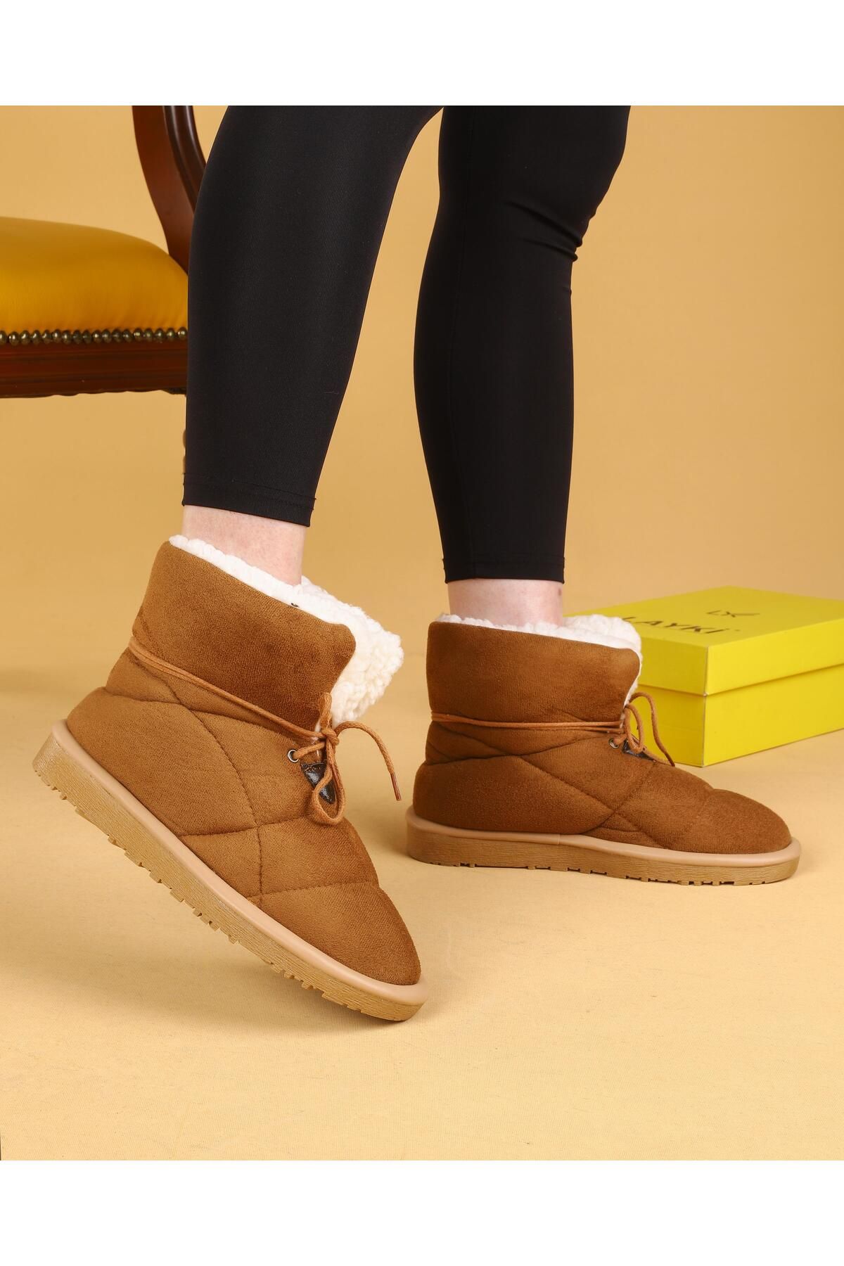 Tan snow best sale boots with fur