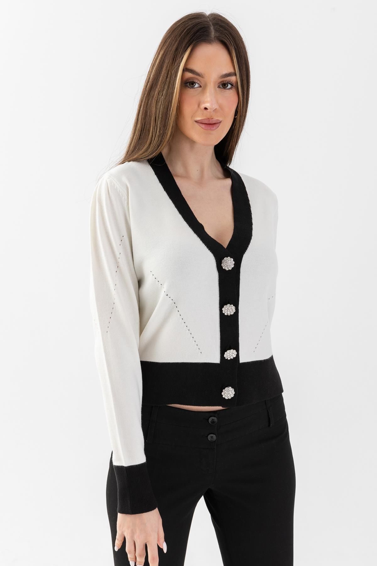 Black cardigan with pearl buttons discount