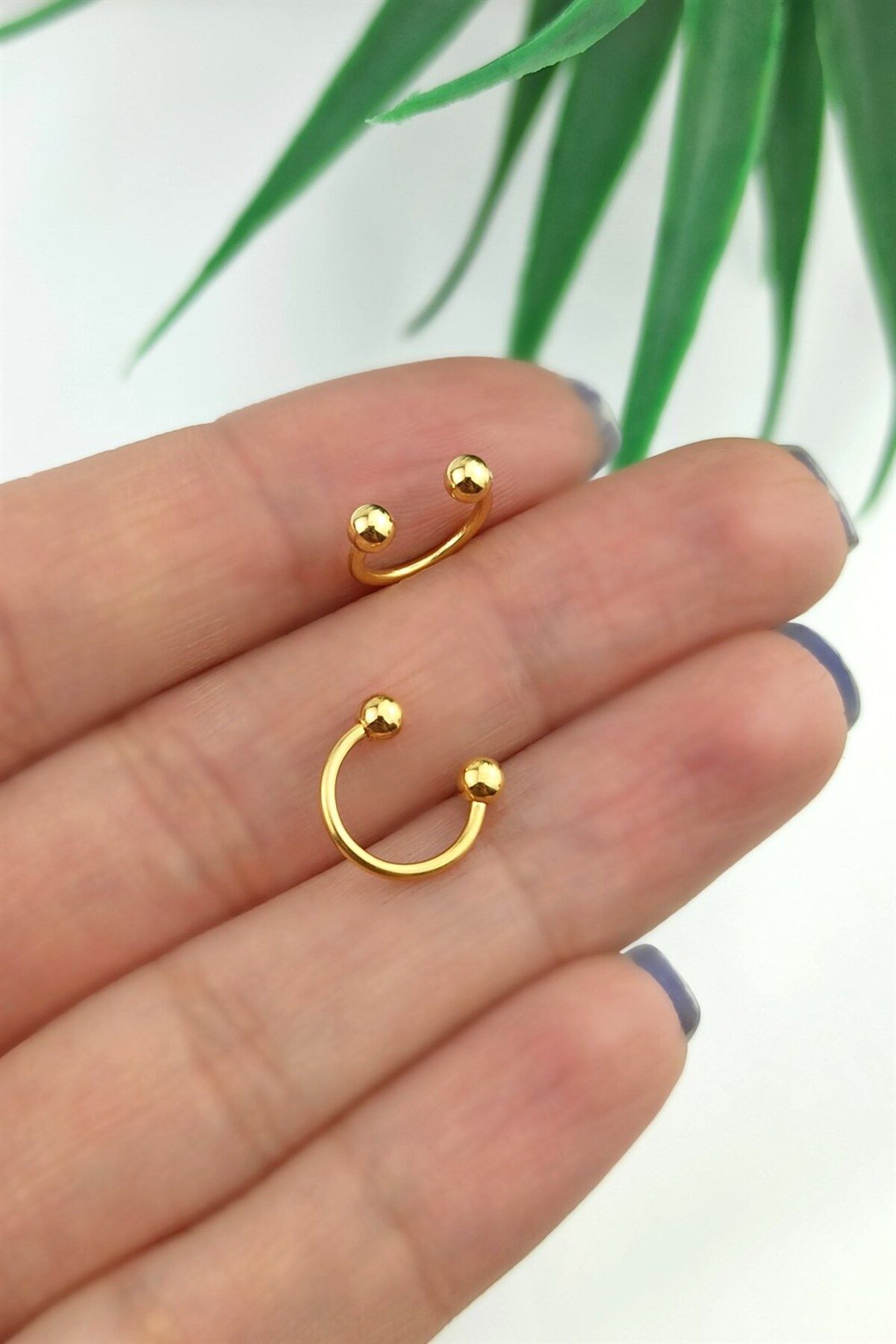 Surgical steel outlet septum ring