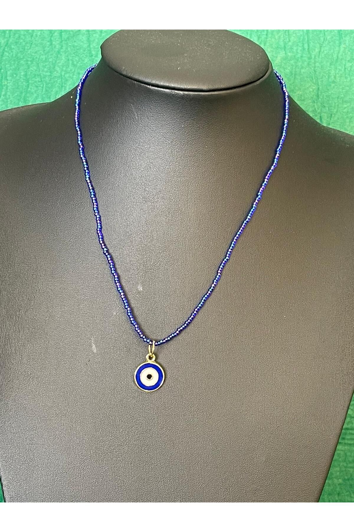 G n lden Tasar m Necklace with Blue Sand Beads and Blue Evil Eye