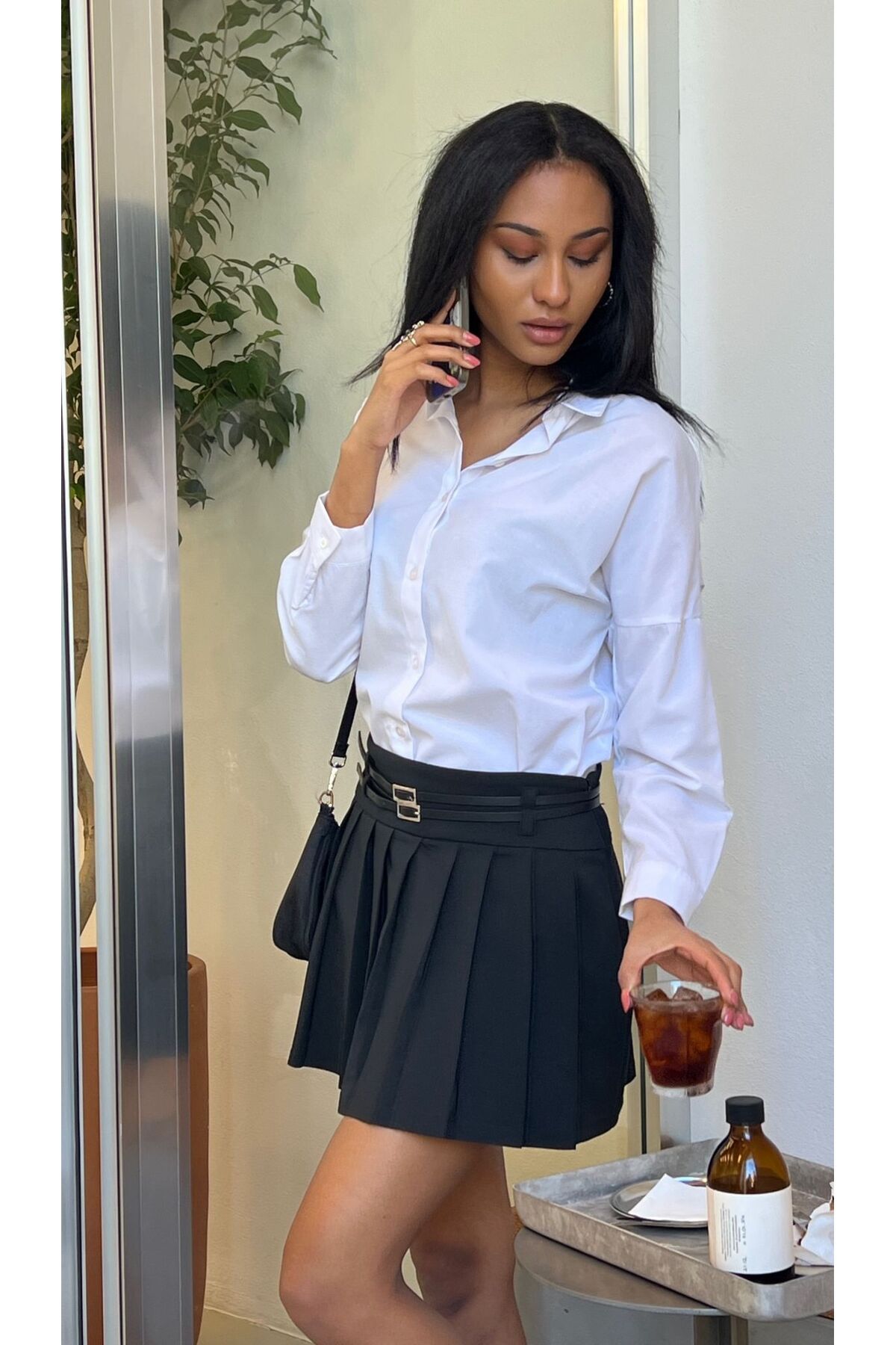 Pleated mini store skirt in store