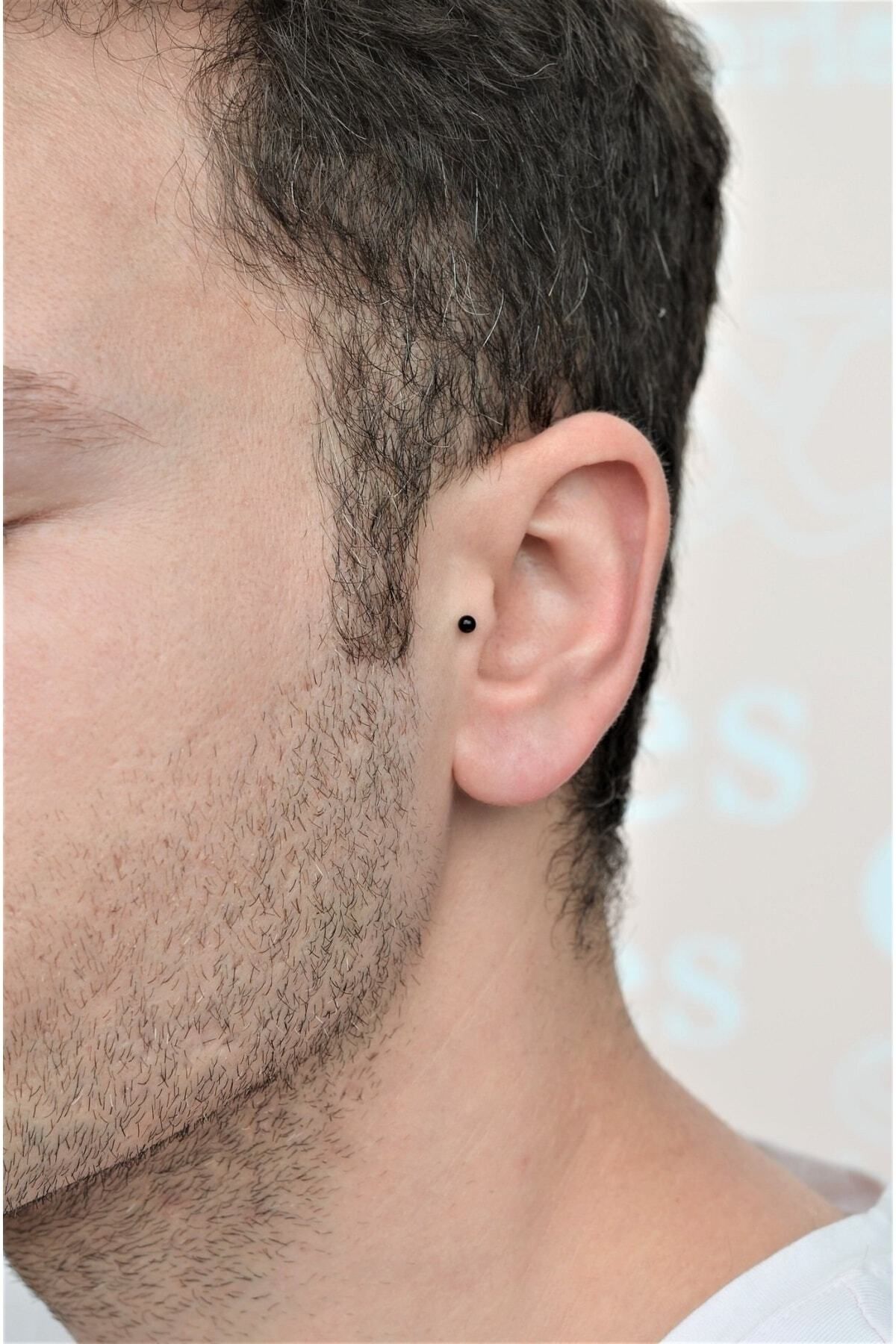 Tragus piercing man outlet